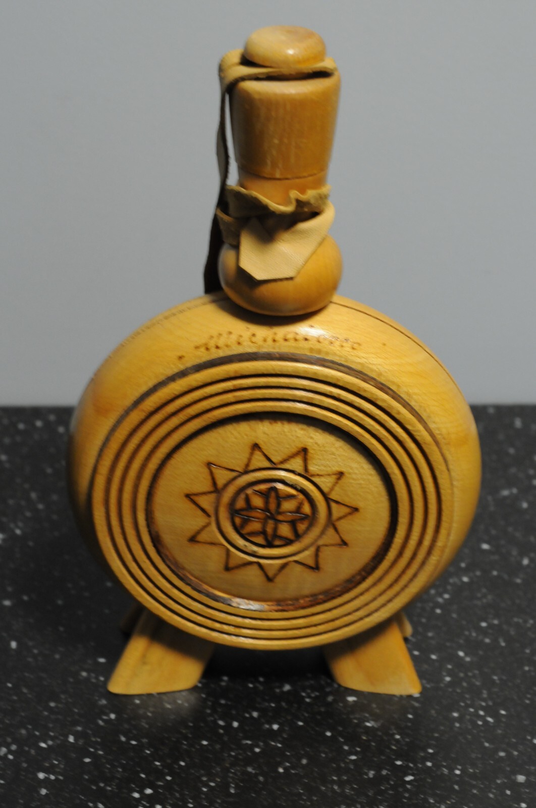 Pair of Carved Wooden flasks, with leather strap.
