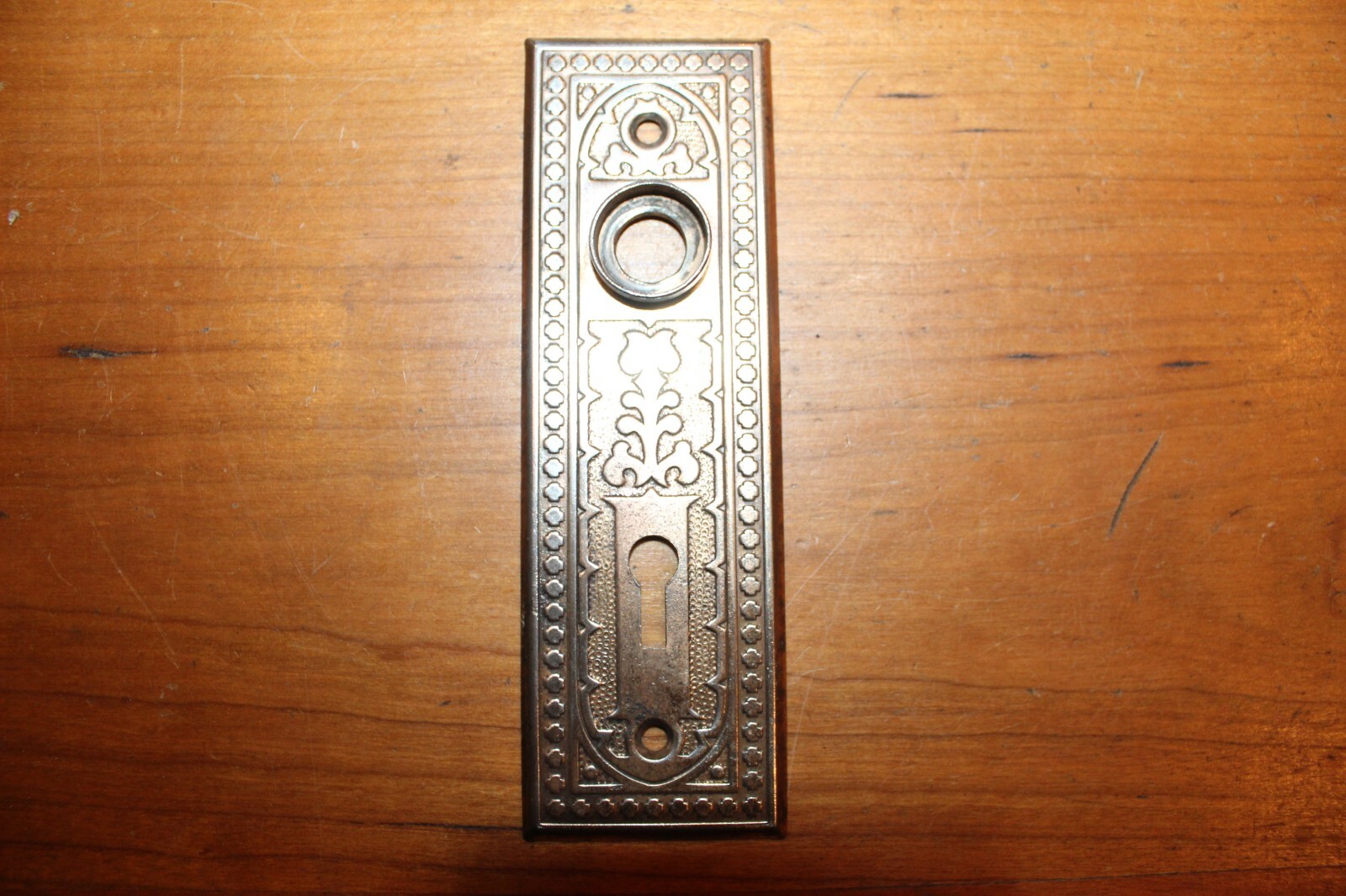 One Victorian Antique Ornate Brass Plated Pressed Steel Escutcheon B-44