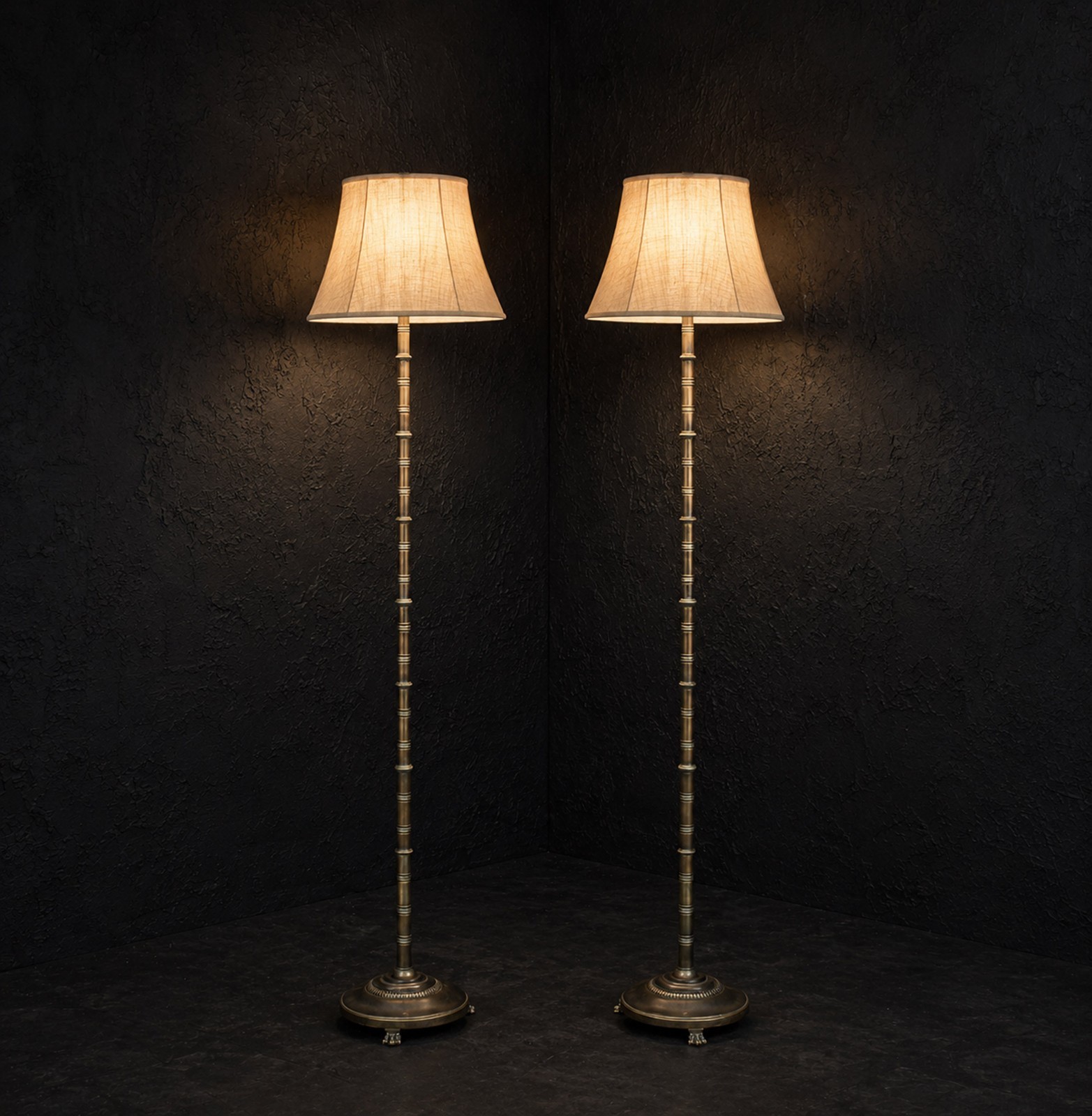 Matched pair of mid-20th Century brass floor lamps with lion paws