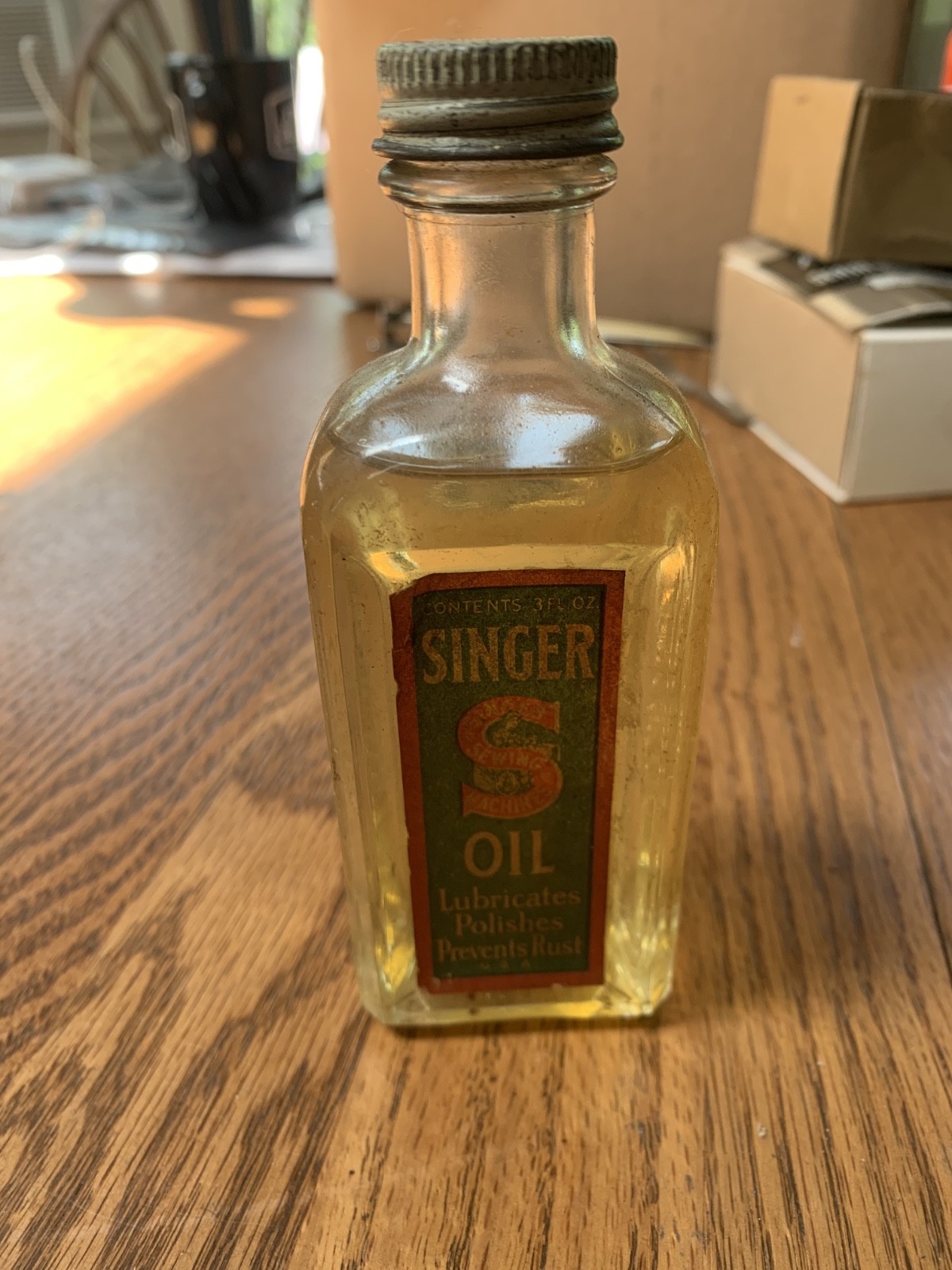 Vintage Singer Co Sewing Machine Oil Embossed Glass Bottle Label Advertising 3oz
