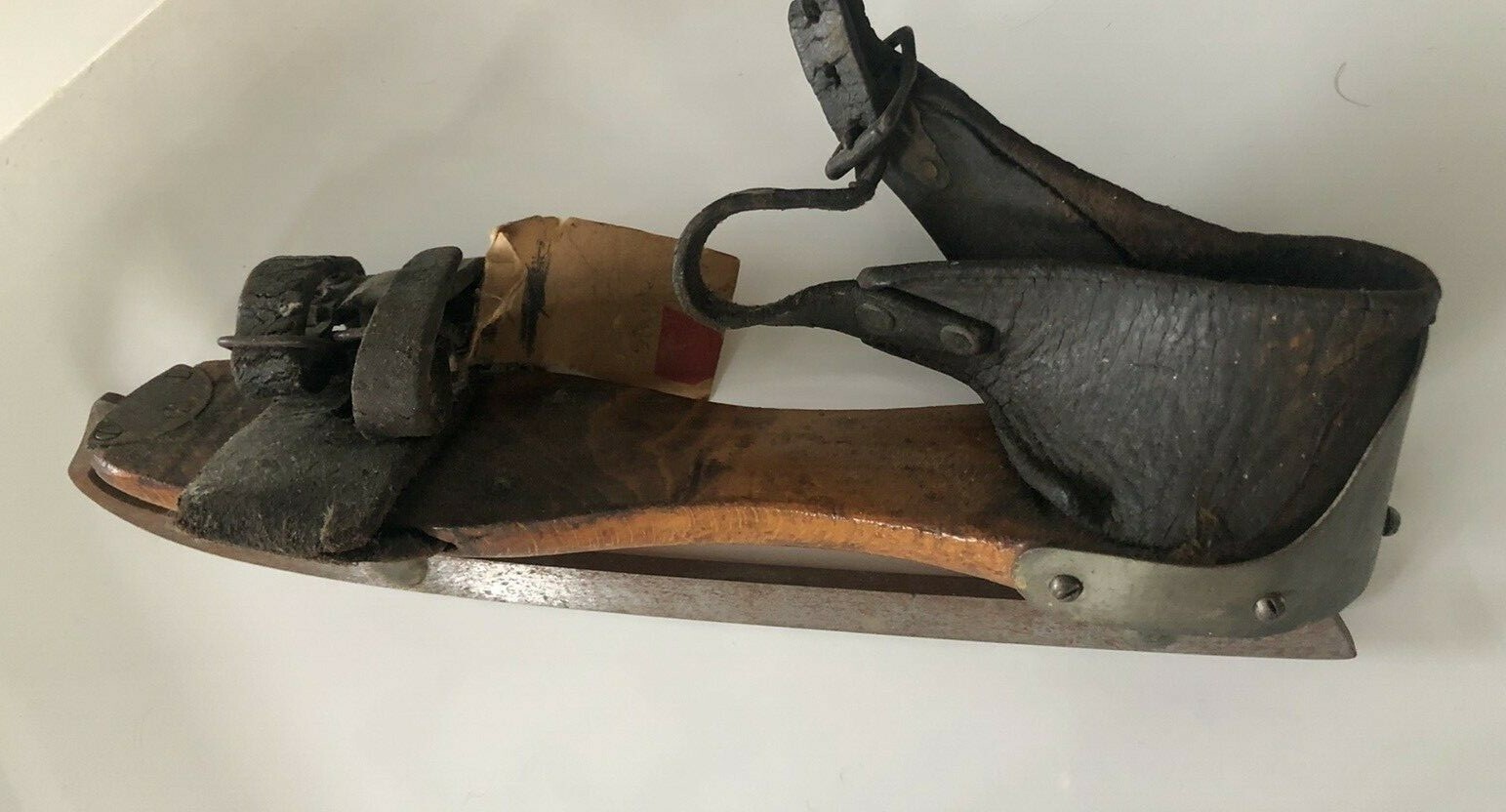 Antique wood leather and steel skate