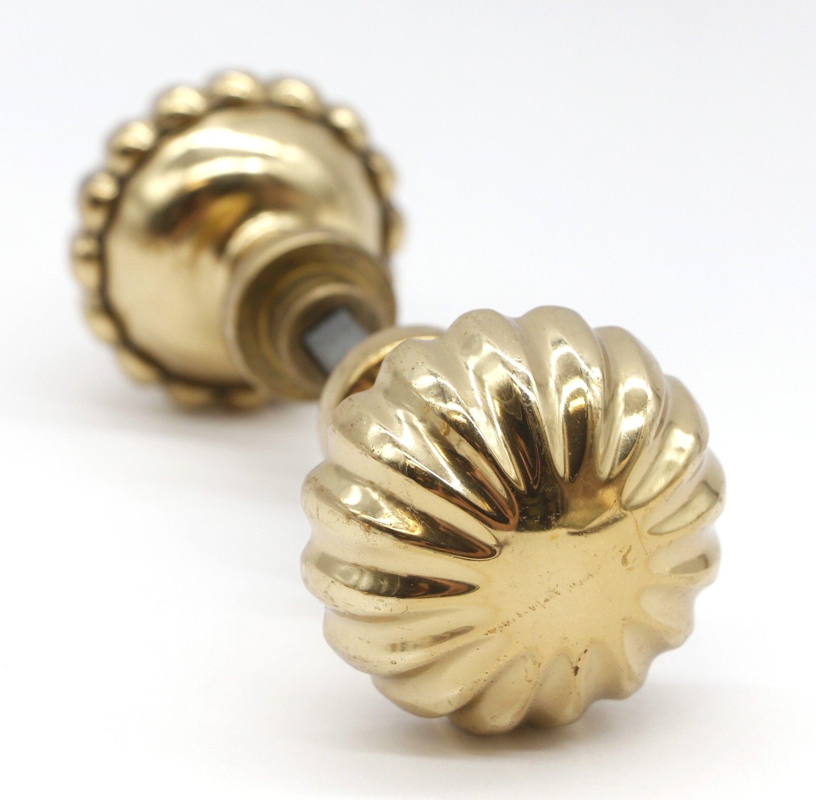 Pair of Vintage 2.25 in. Polished Brass Fluted Door Knobs