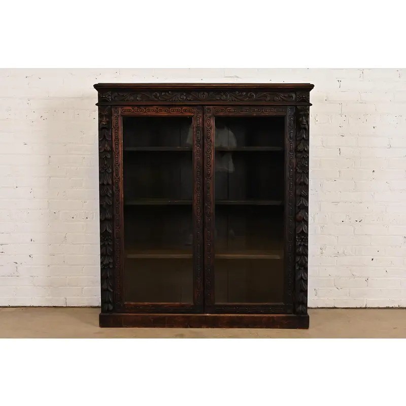 R. J. Horner Style Antique Victorian Carved Oak Bookcase Cabinet, Circa 1880s
