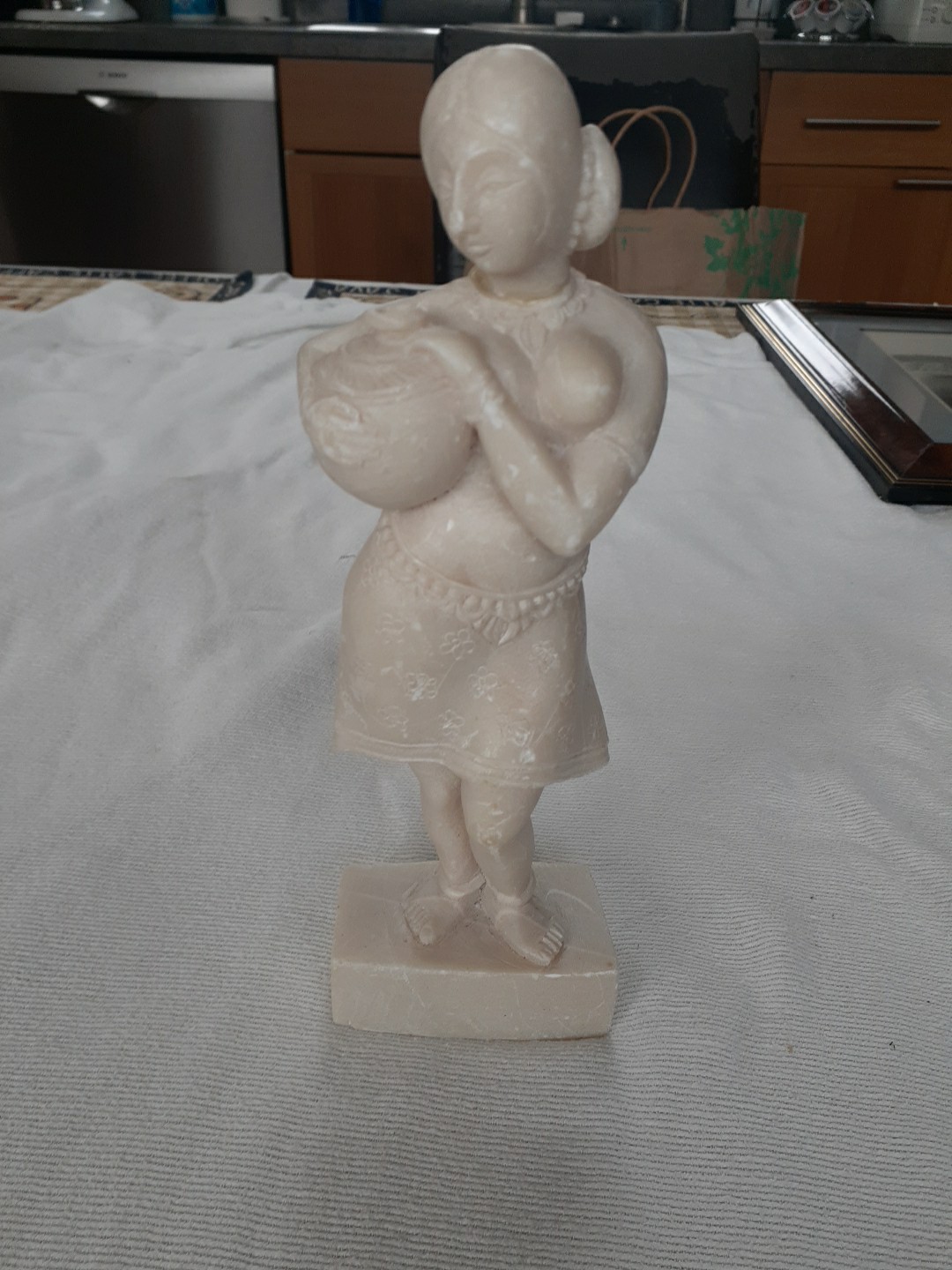Vintage Female Figure Holding Jug