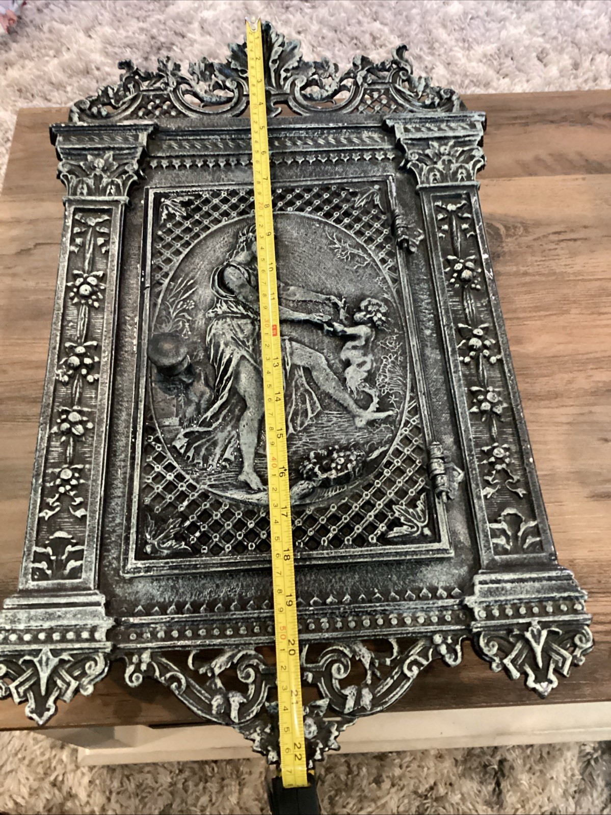 Antique cast iron fireplace door repurposed into wall mounted safe/jewelry box