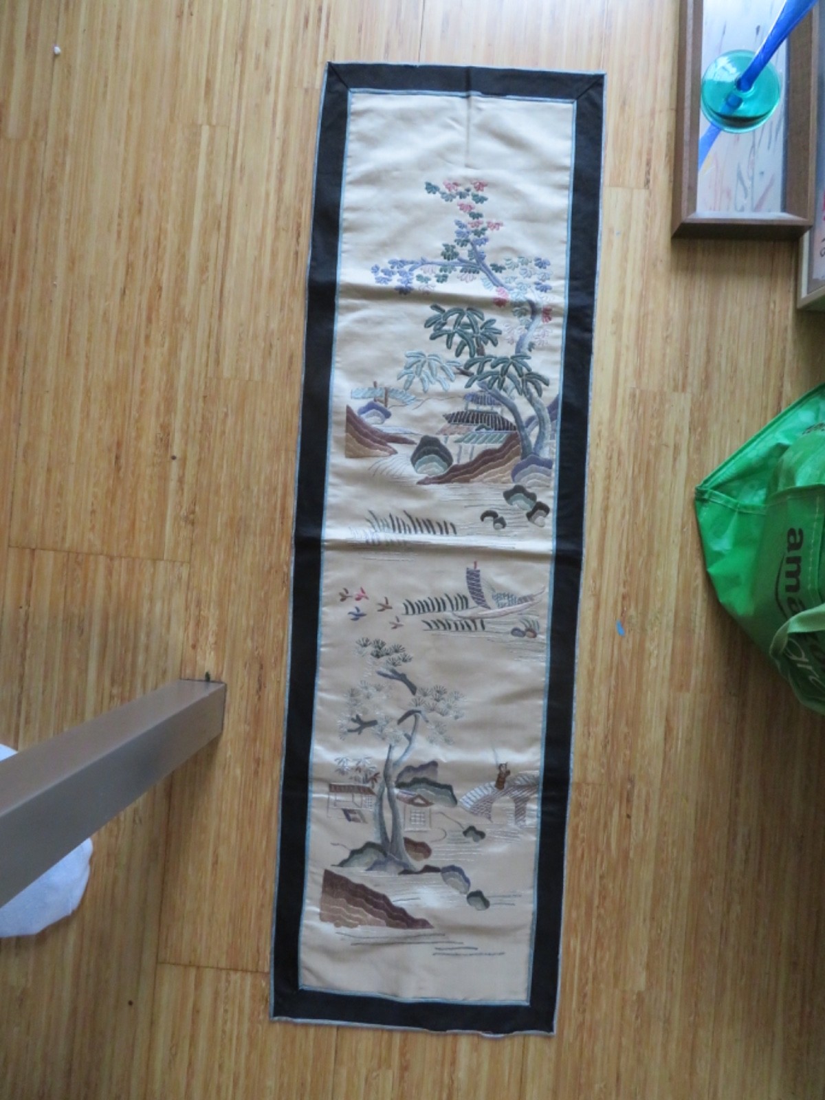 OLD CHINESE EMBROIDERED CREAM SILK PANEL WITH FIGURE, BOAT, PAGODA IN LANDSCAPES