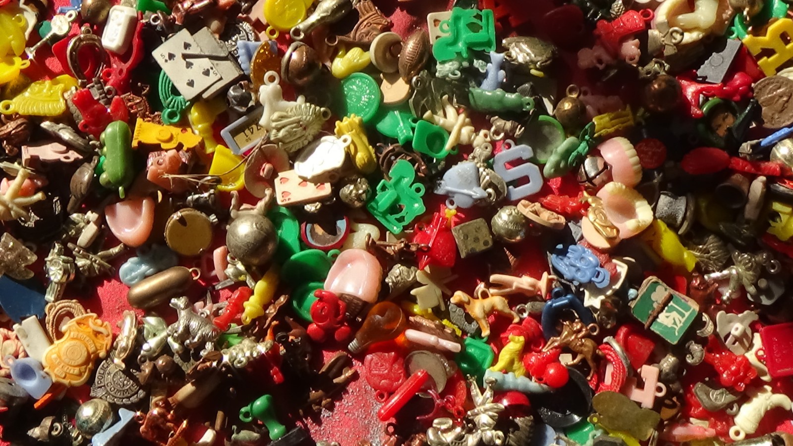 1100 VINTAGE CHARMS FROM THE 1940S, 50S, AND 60S. EVERYTHING IMAGINABLE IS HERE.