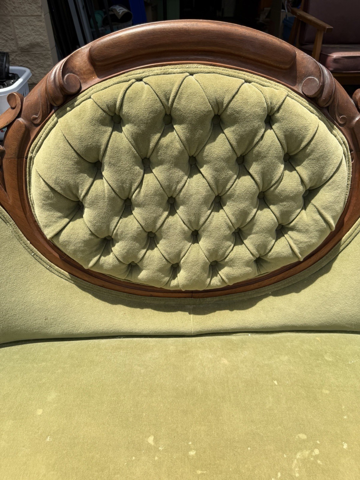 Antique Victorian settee with Green Velvet Upholstery & Carved Wooden Back