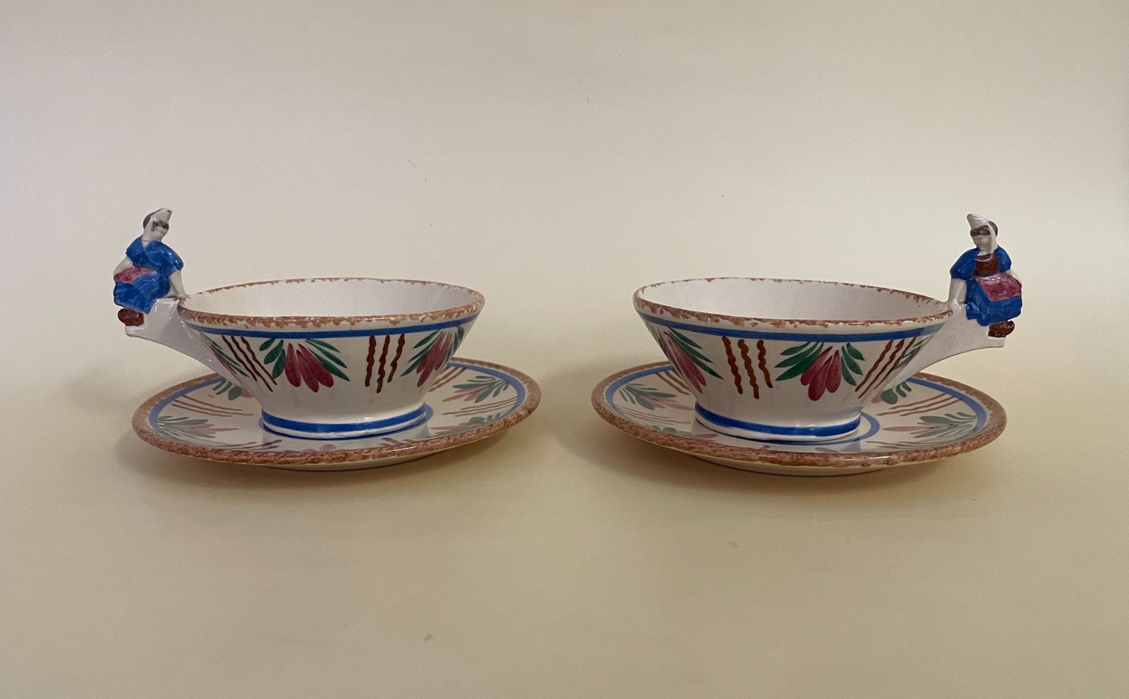 France Henriot Quimper Breton Faience Cup & Saucer Figural Handles