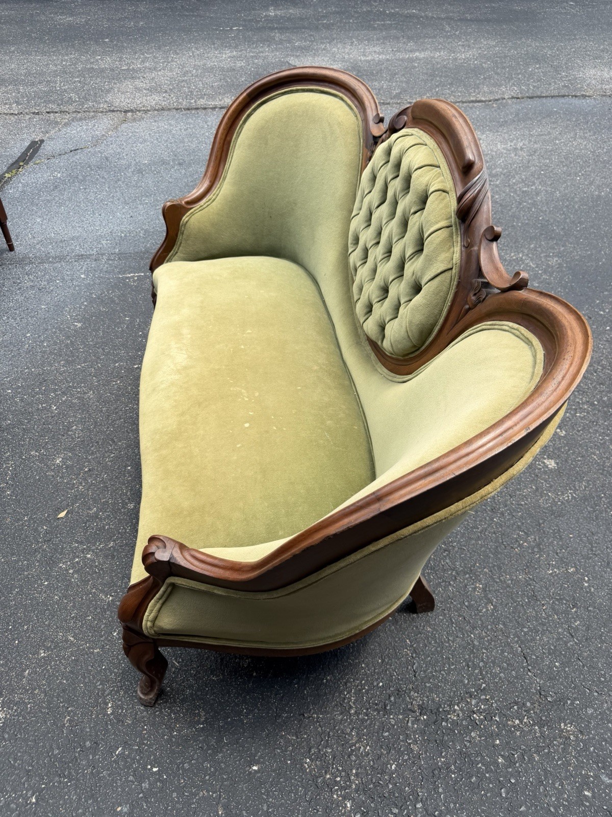 Antique Victorian settee with Green Velvet Upholstery & Carved Wooden Back