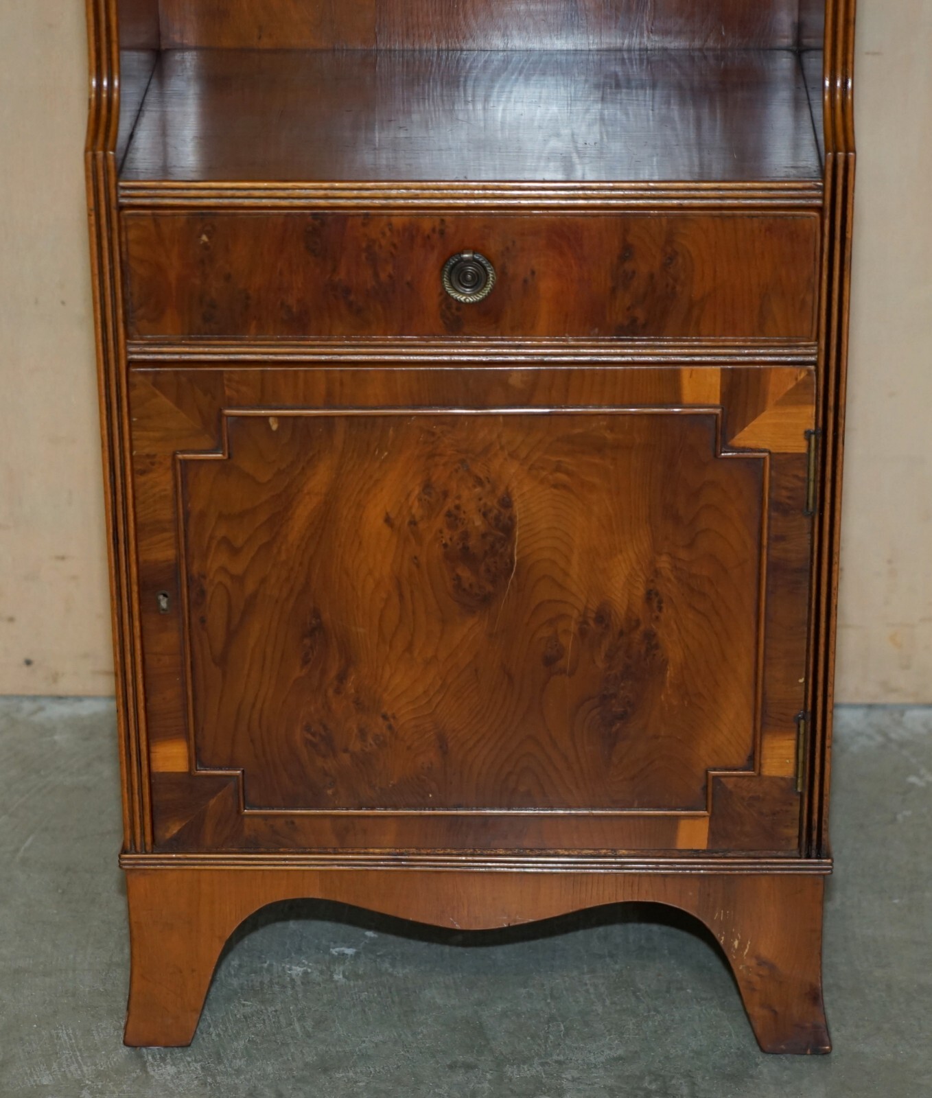 PAIR OF VINTAGE ENGLISH FLAMED MAHOGANY WATERFALL BOOKCASES WITH CUPBOARD BASES