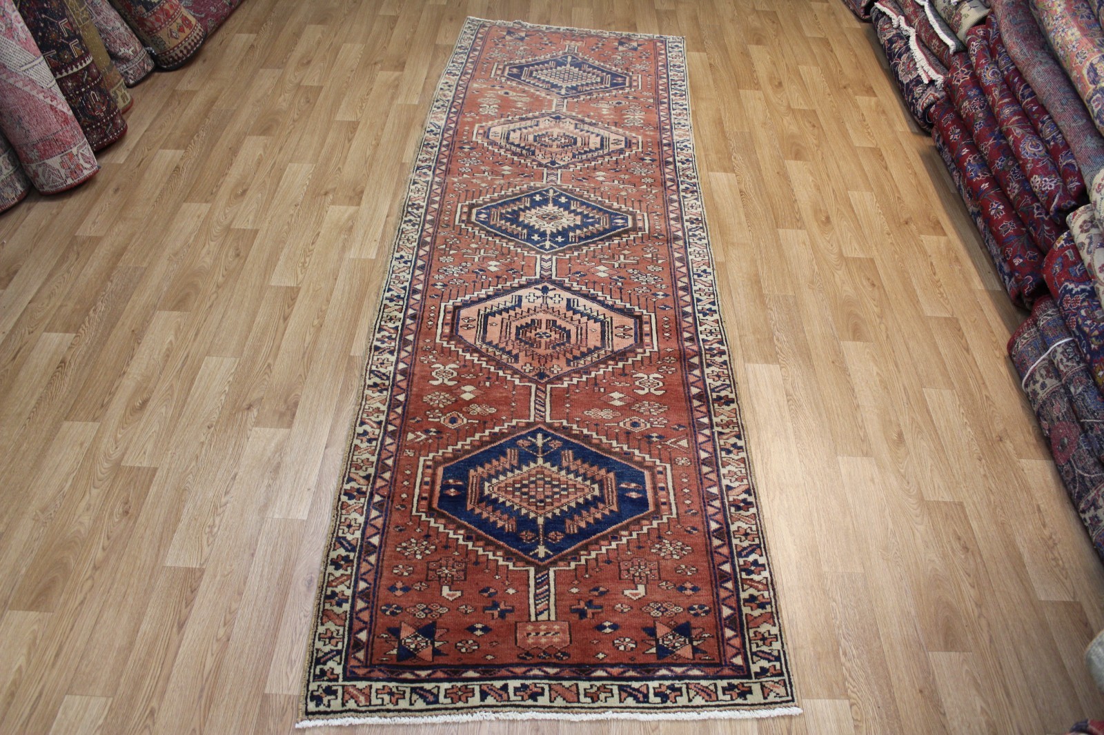 Fine old handmade Heriz runner with a striking five linked medallion design