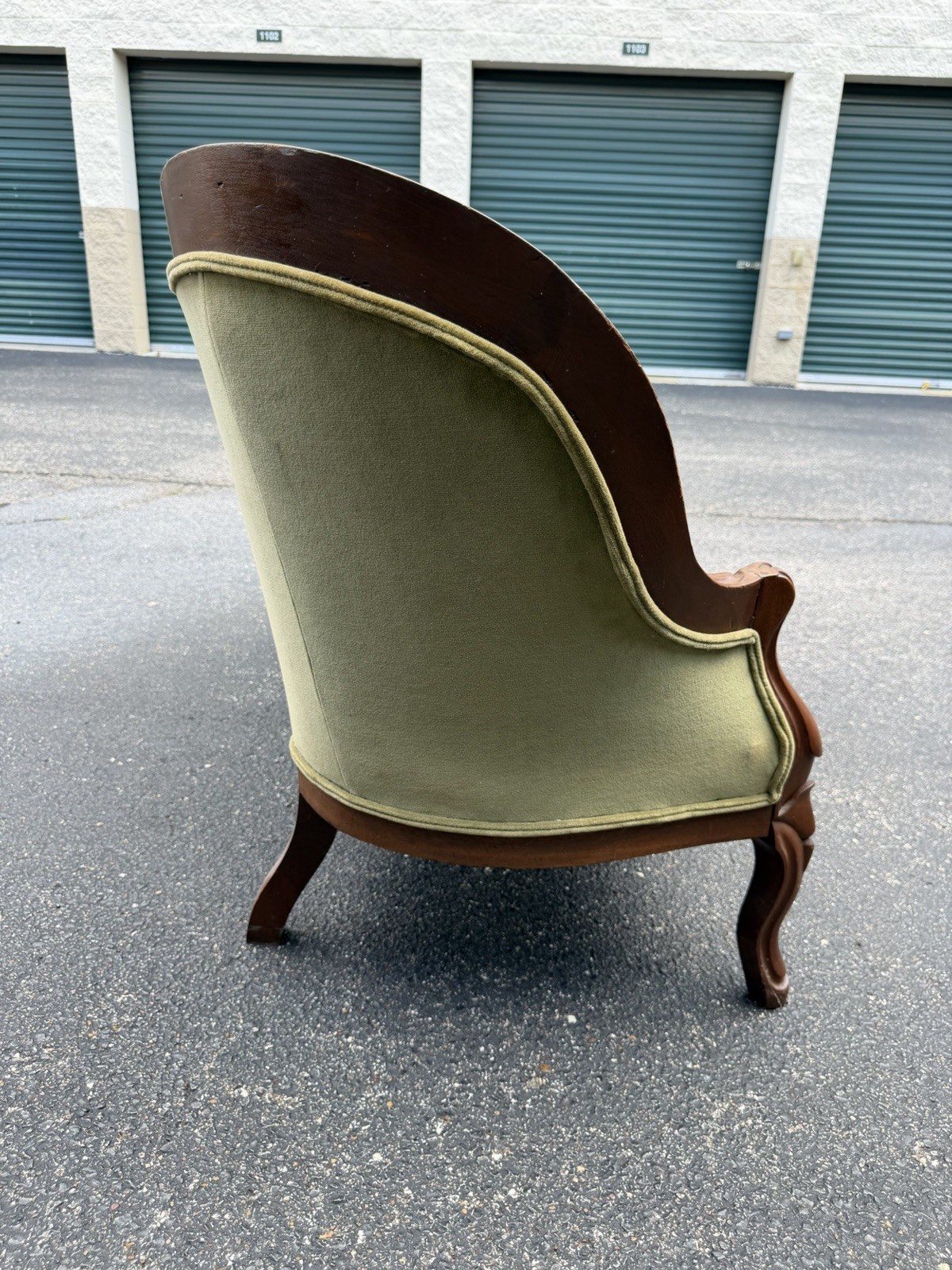 Antique Victorian settee with Green Velvet Upholstery & Carved Wooden Back