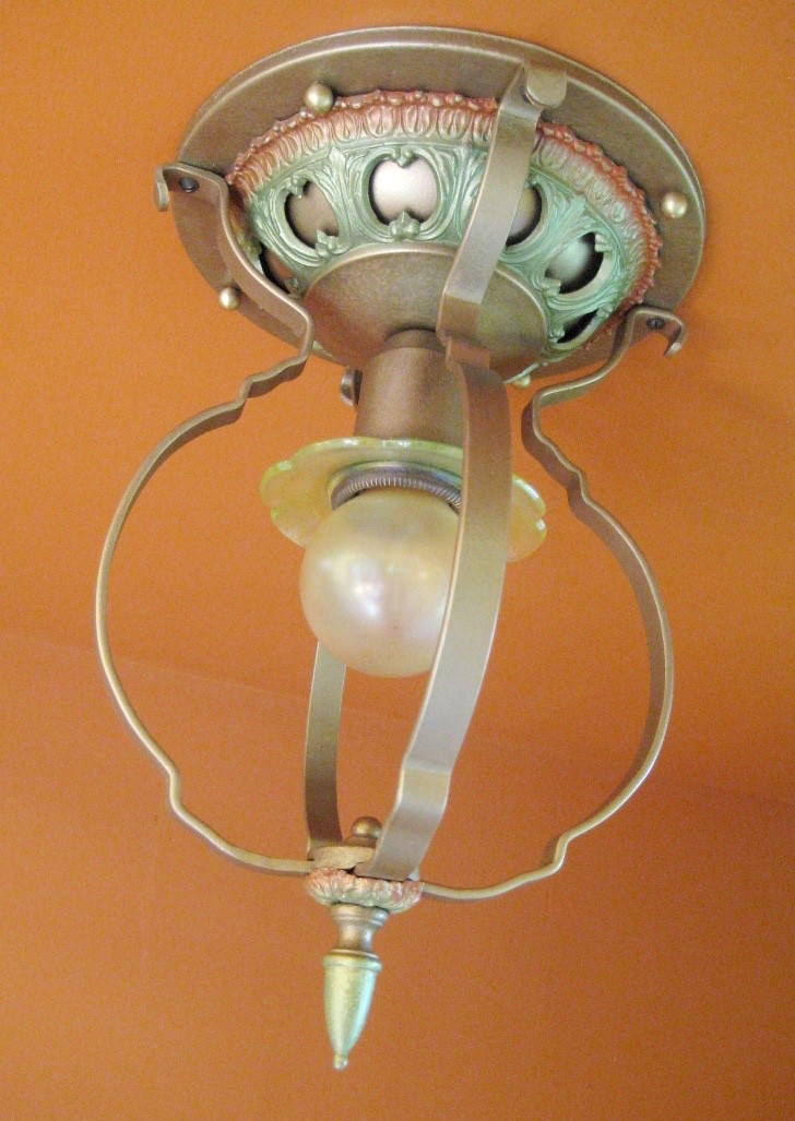 Vintage Lights 1920s Foyer surface mount by Lightolier. Iridescent glass ring