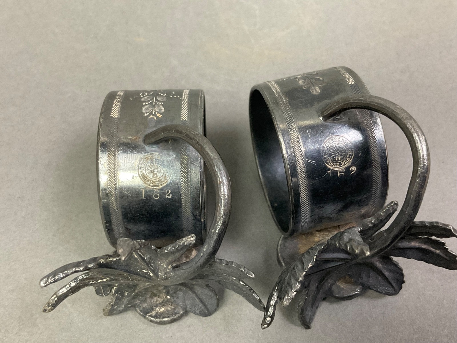 Pair ANTIQUE NAPKIN RING HOLDERS Figural Flower Silver Plated Monogrammed