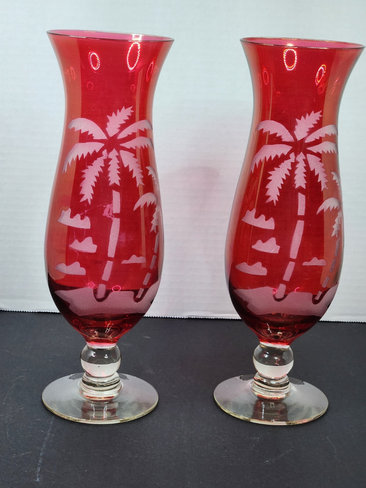 MARION, OHIO GLASS CO PAIR OF VASES/GLASSES, CLEAR TO RED, WITH CUT DESIGN