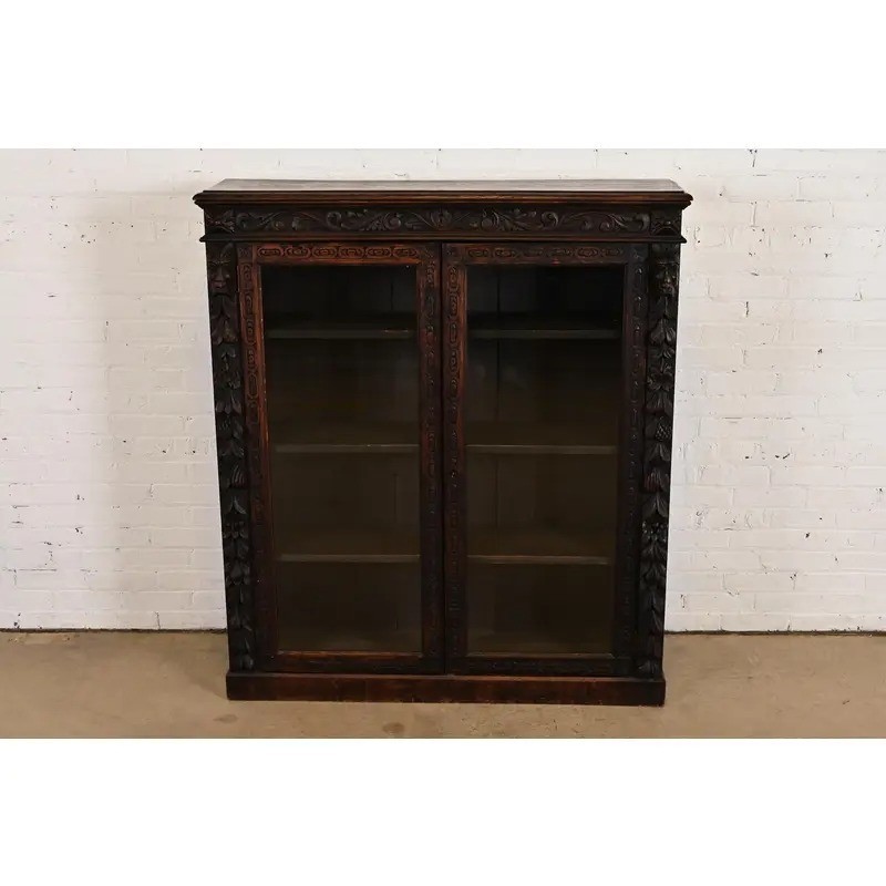 R. J. Horner Style Antique Victorian Carved Oak Bookcase Cabinet, Circa 1880s
