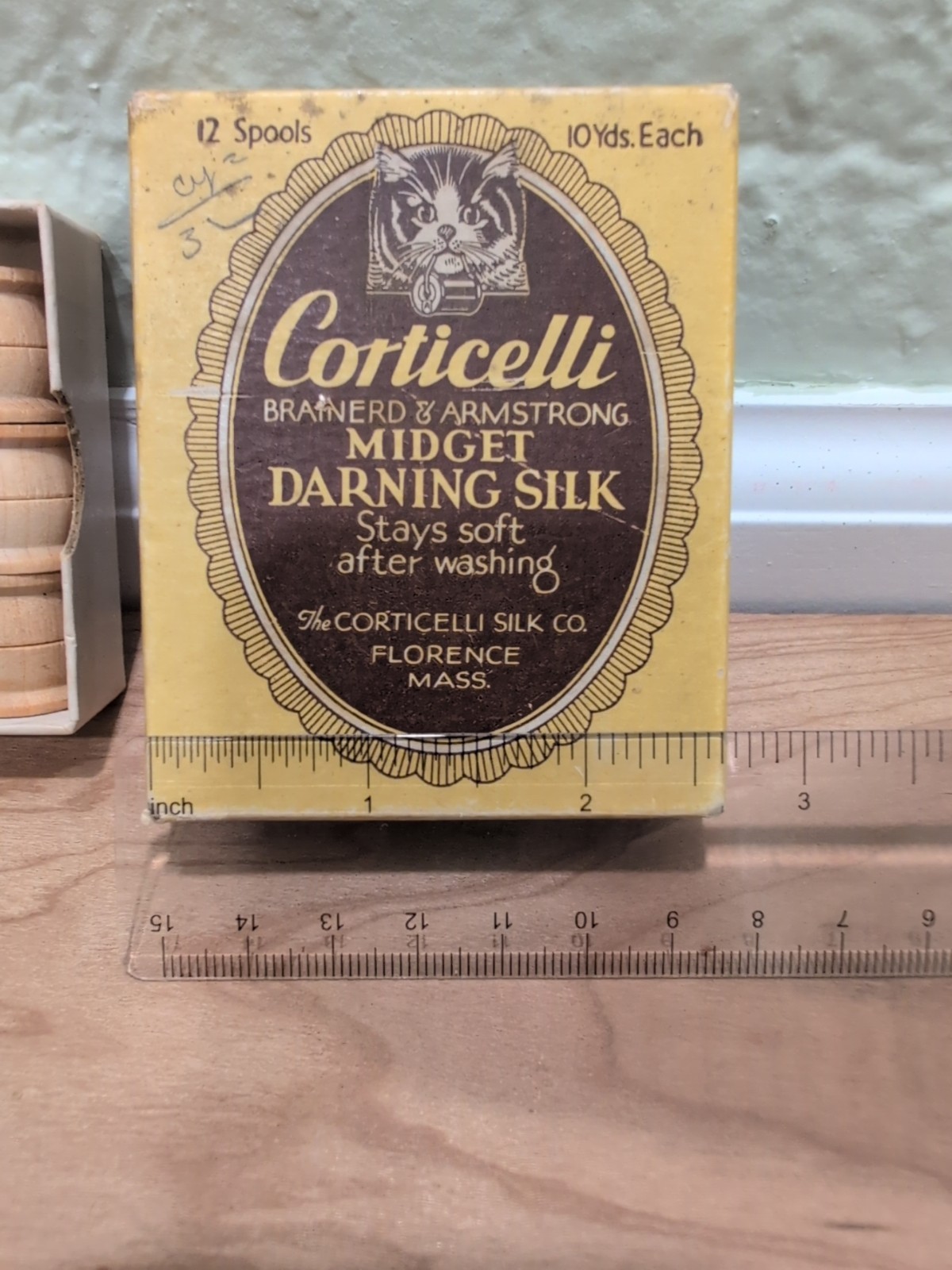 Antique Corticelli “Midget Darning Silk” Box & Nine Wooden Spools (Spools Only)