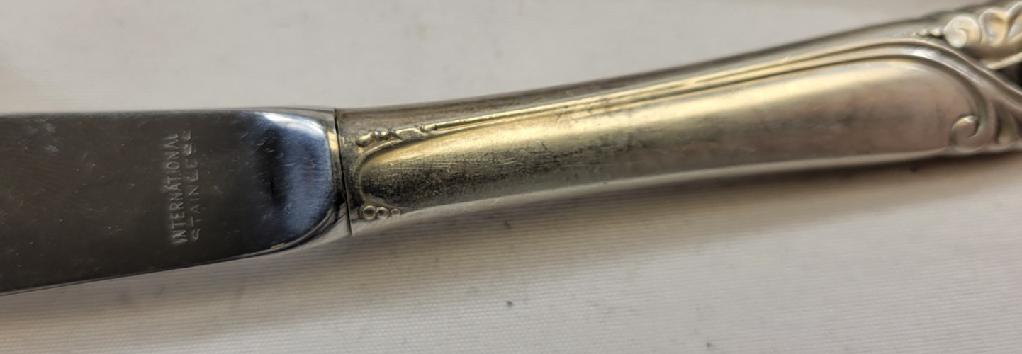 “Spring Glory” Flat Solid Butter Spreader Knife-5 3/4″ International Sterling