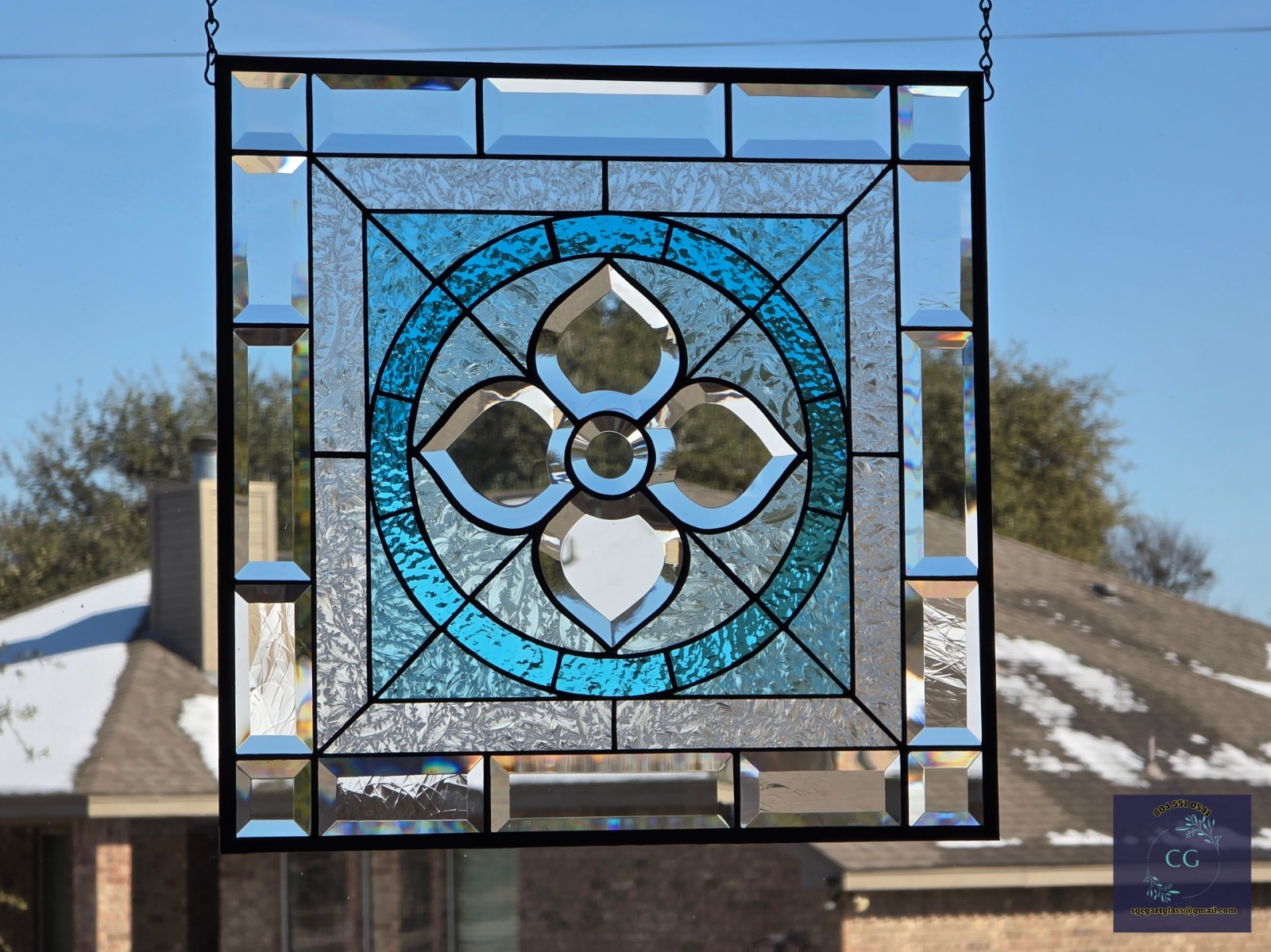 Contemporary sky blue and clear stained glass window panel, 18 3/4″.
