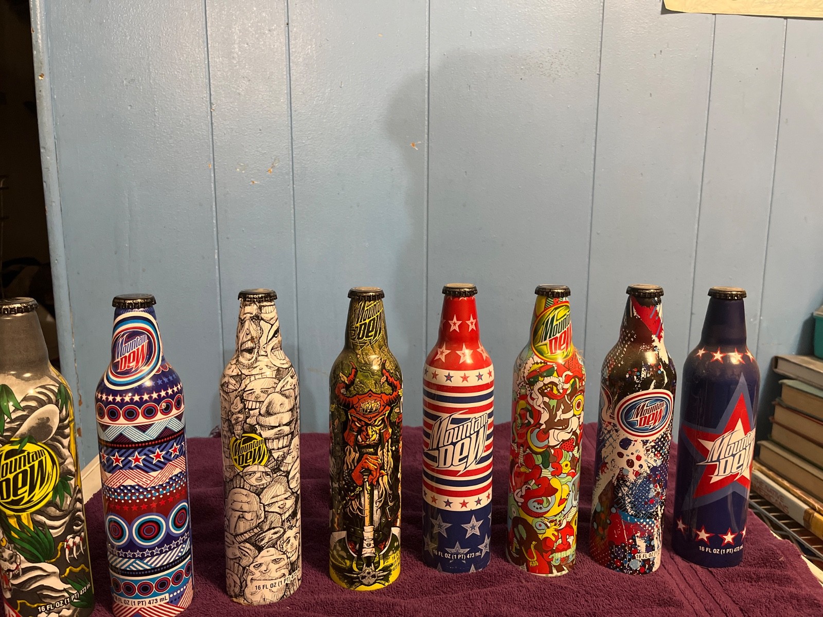 8 piece Collector’s Set of 16oz Mountain Dew Bottles | Green Label Art