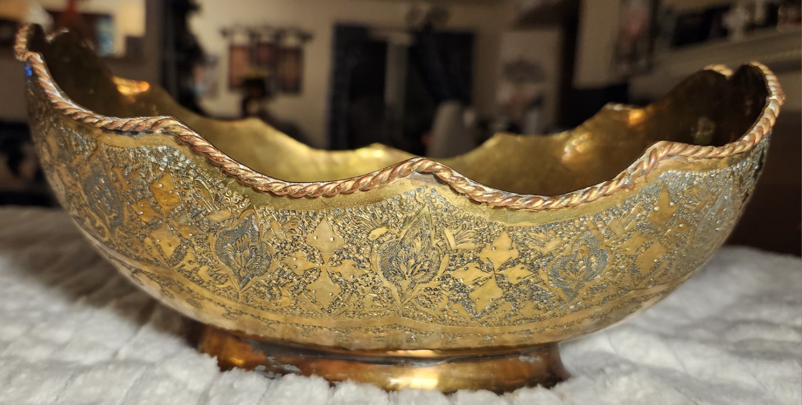 Antique Middle Eastern brass decorative set with engraved floral motifs.