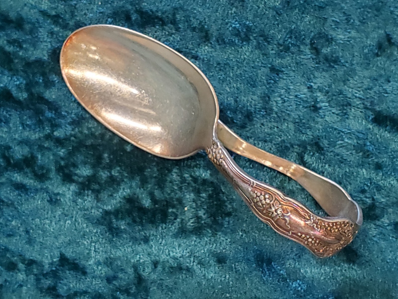 Vintage pattern curved baby spoon International Rogers triple silverplate grapes