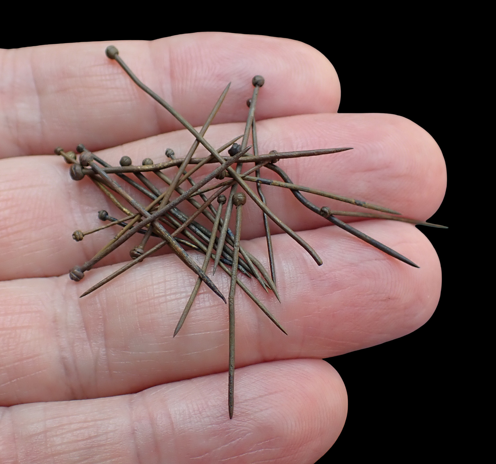 20 handmade brass pins with wrapped heads from the 16th. / 17th. century.