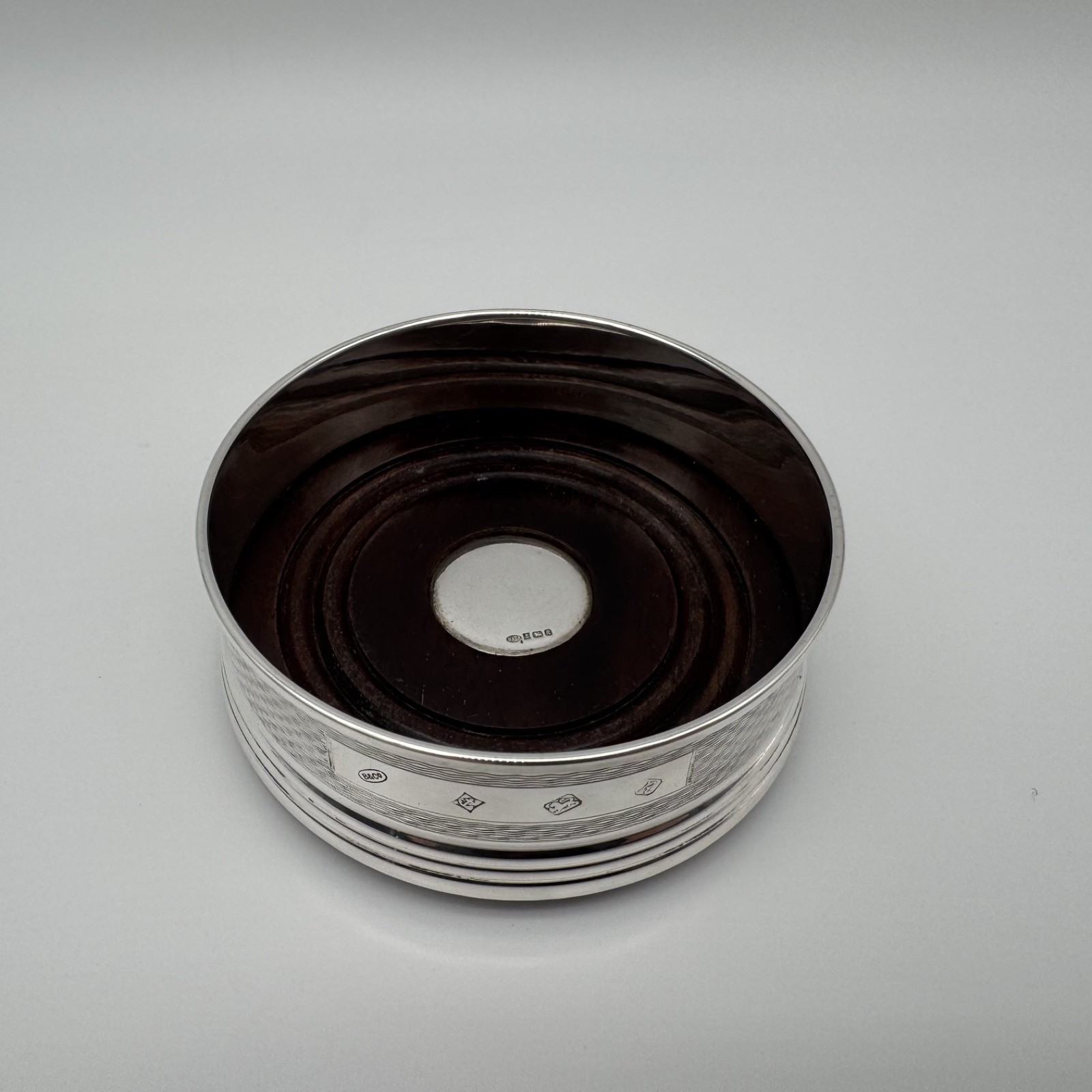 Sterling Silver and Mahogany Bottle Coaster by Broadway & Co – Birmingham 1991