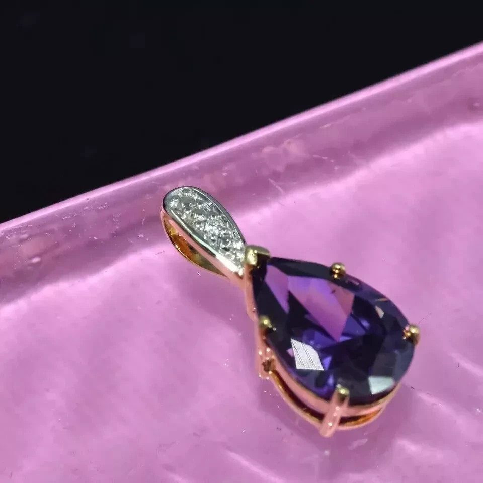 1.50Ct Pear Cut Lab Created Amethyst Women’s Pendant In 14K Yellow Gold Finish.