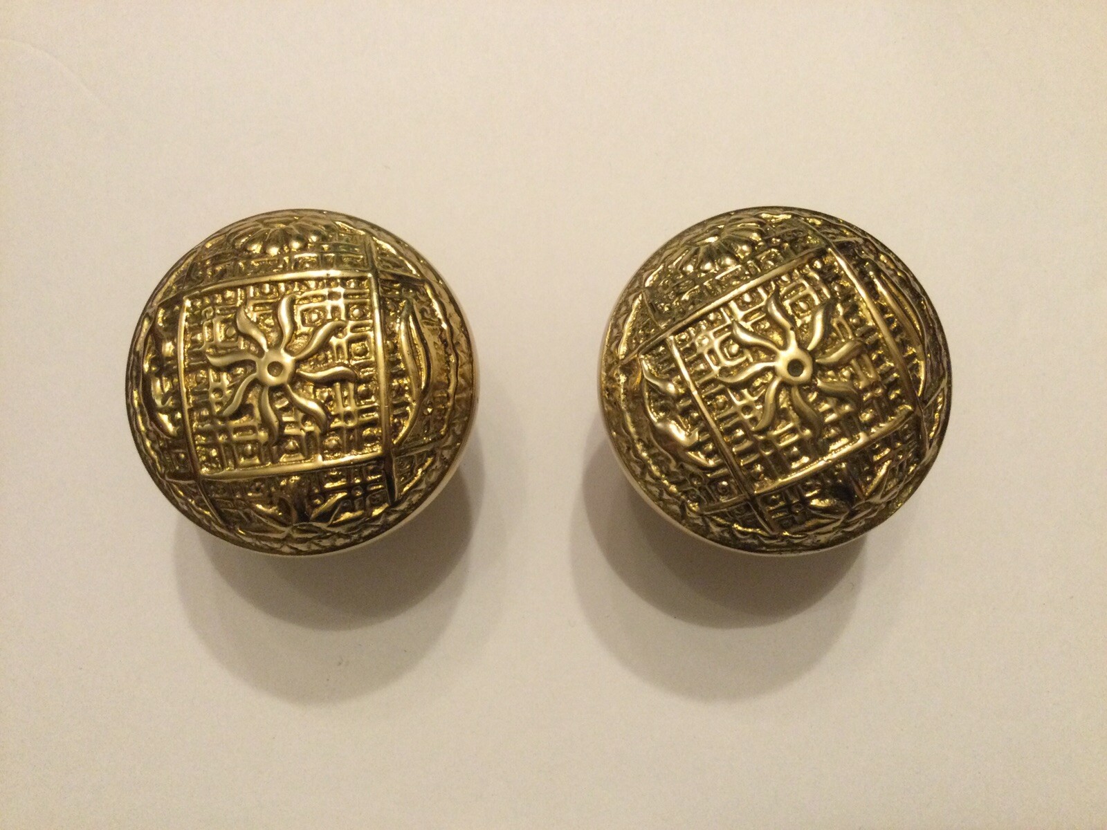 Pair Of Antique Looking Brass Embossed Door Knobs