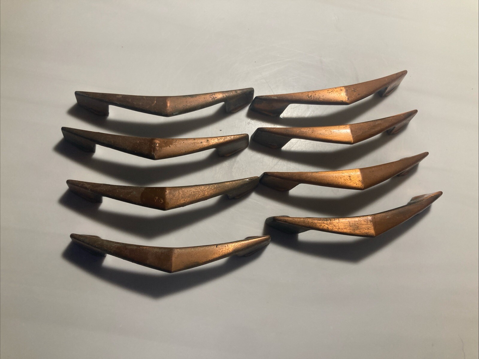 Set Of 8 Copper Plated Brass Curved Bridge Drawer Pulls