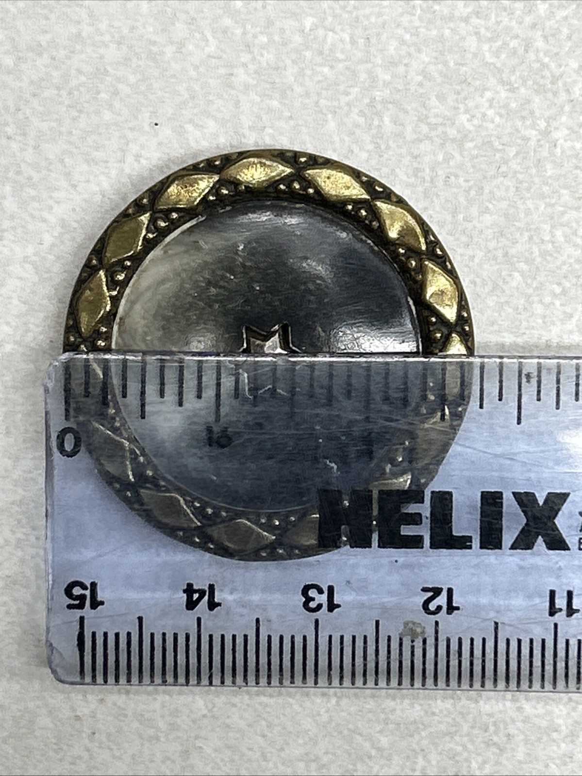 Antique Metal Celluloid Button Shooting Multifaceted Six Point Star Center