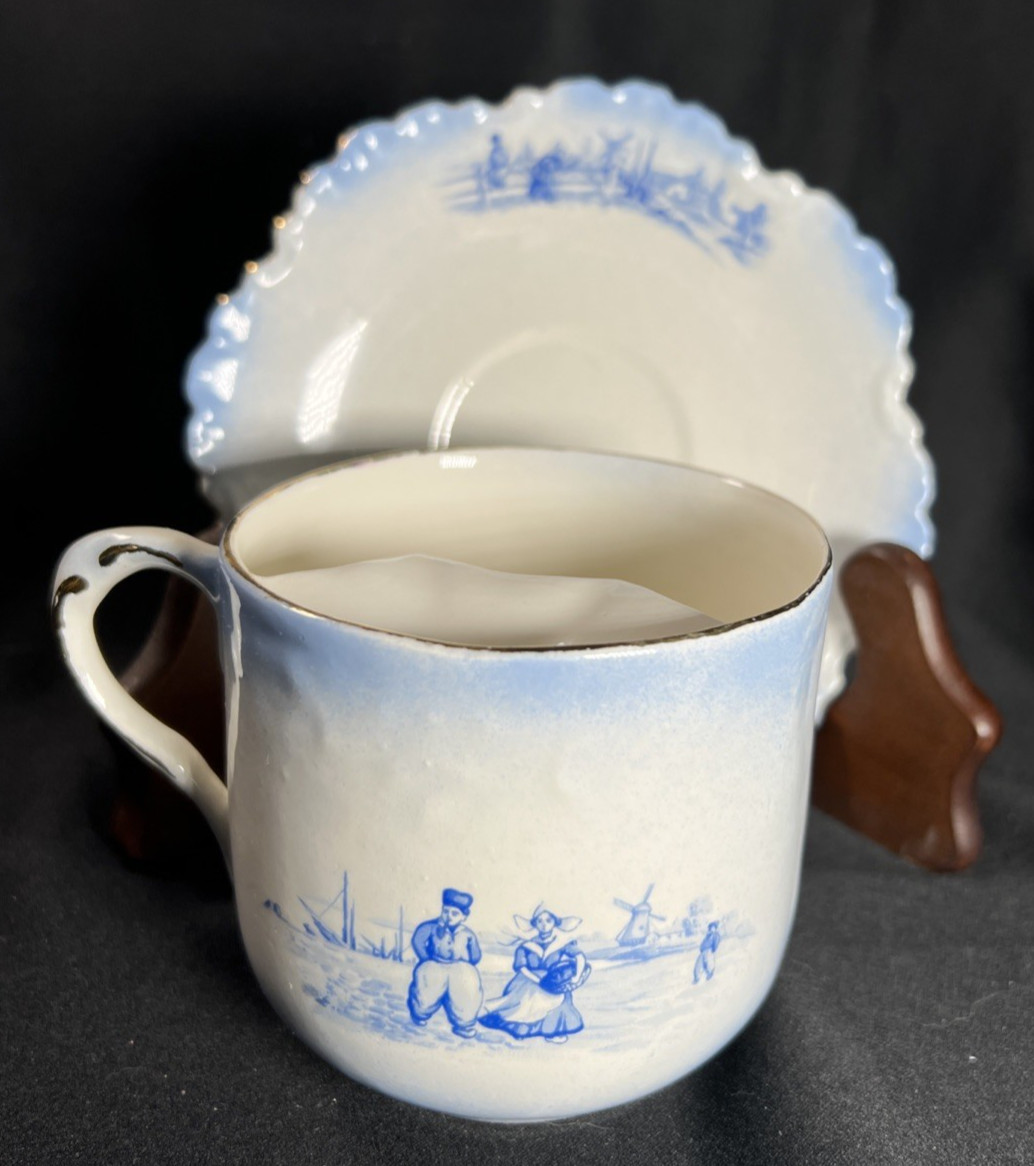Antique Blue and White Porcelain Mustache Cup with Matching Saucer