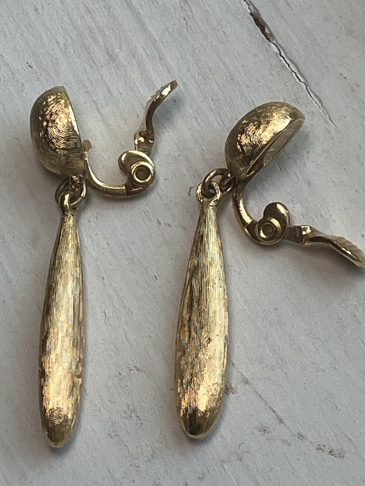 MONET GOLD TONE DANGLE CLIP ON EARRING