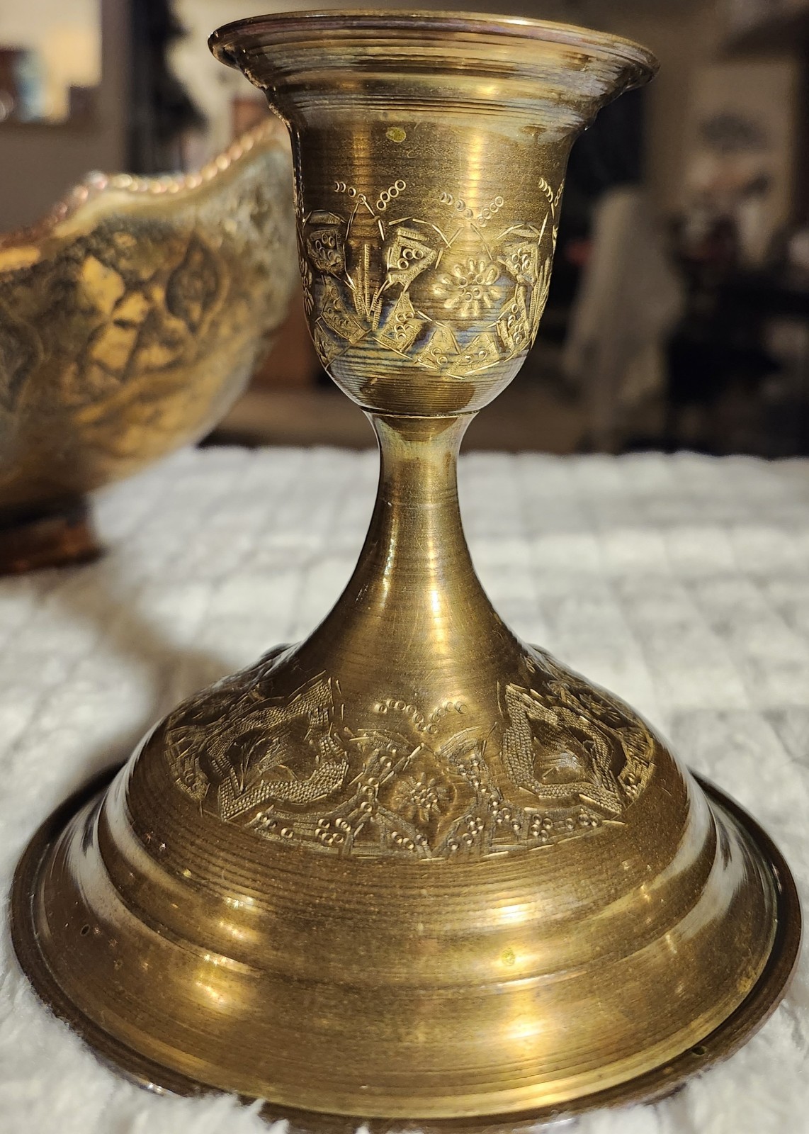 Antique Middle Eastern brass decorative set with engraved floral motifs.