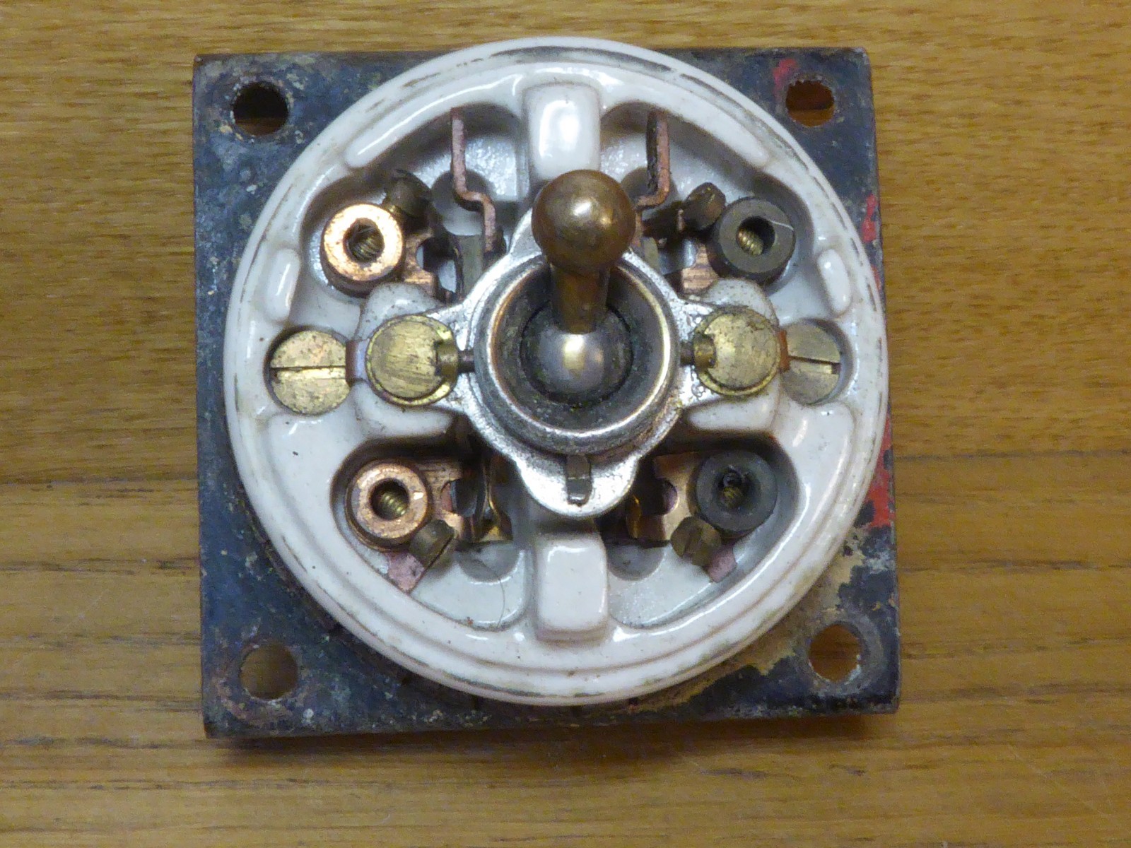 Antique Crabtree Ceramic Dolly Switch with Brass cover.Single gang light switch