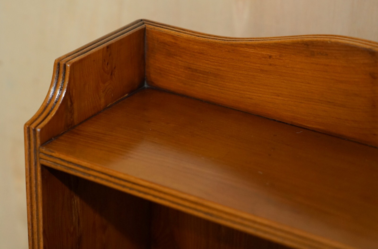 PAIR OF VINTAGE ENGLISH FLAMED MAHOGANY WATERFALL BOOKCASES WITH CUPBOARD BASES