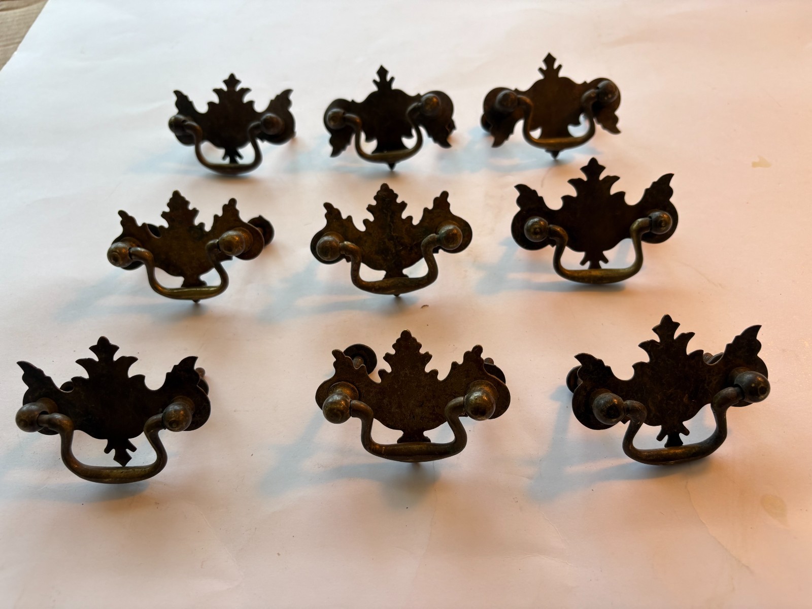 Antique Drawer Pulls Nine 9, Brass Batwing Pulls (Plus one incomplete no cost).