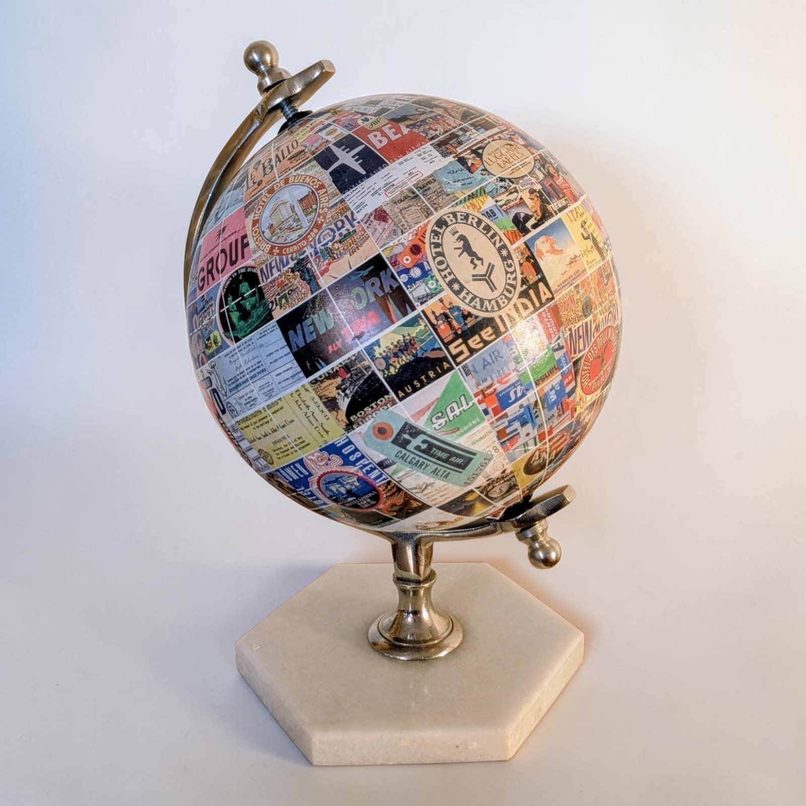 World Globe 9 X 9 X 9 Approx. Uniquely created with travel stamps