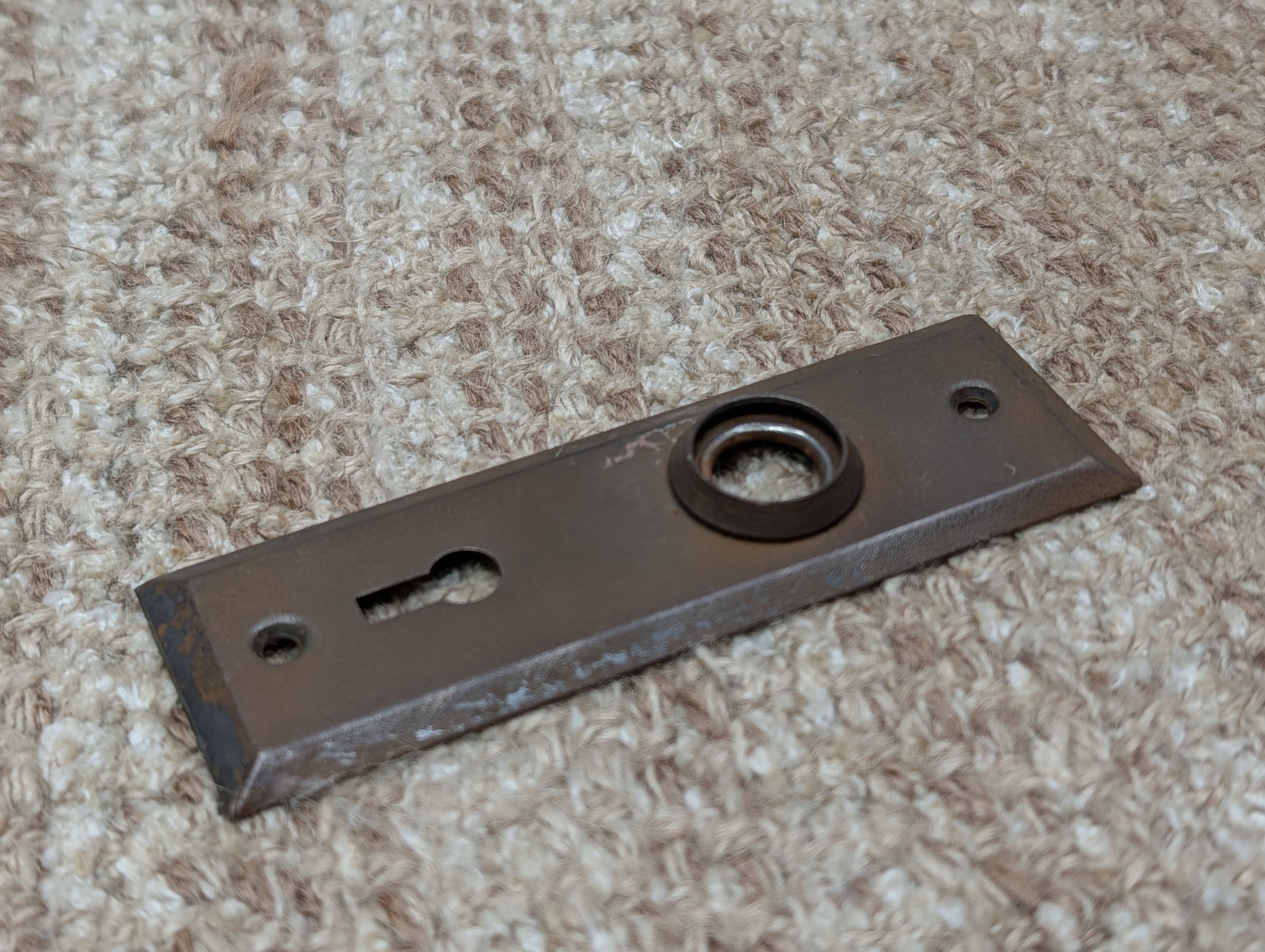 1 1/2″ x 4 1/2″ Antique Stamped Steel Door Knob Plate