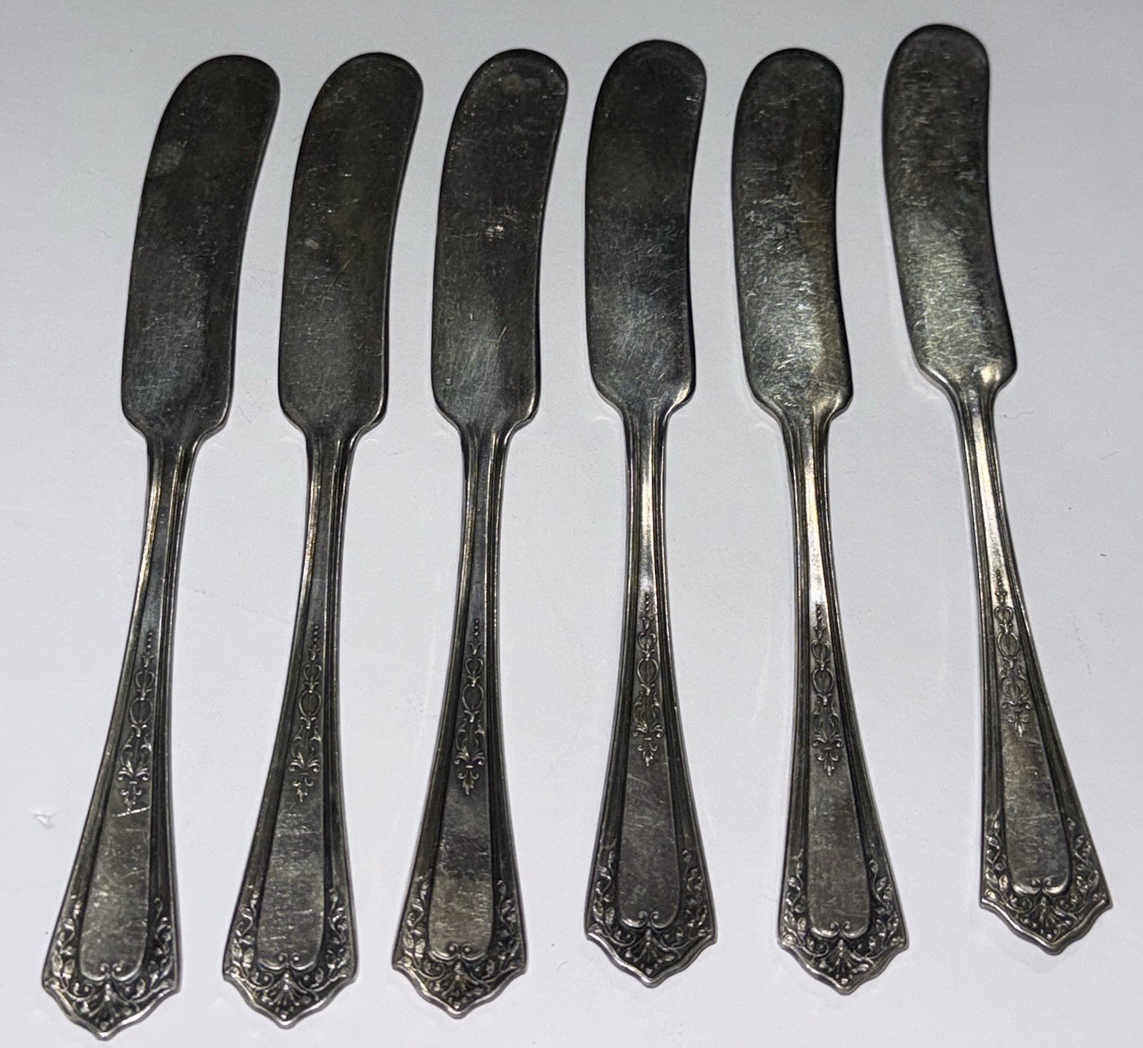 Vintage Continental 1886 Silver Plate Three Pattern Butter Spreaders Lot of 6