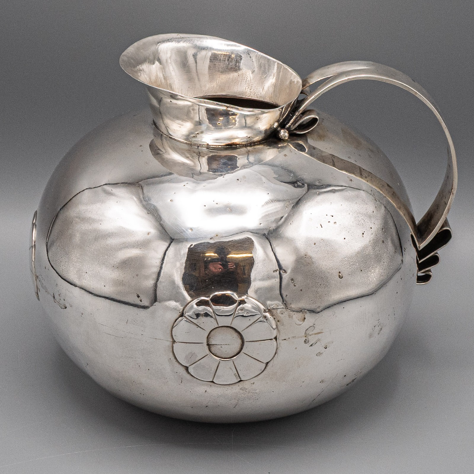 William Spratling Sterling Silver Flower Embossed Round Base Water Pitcher 1940s