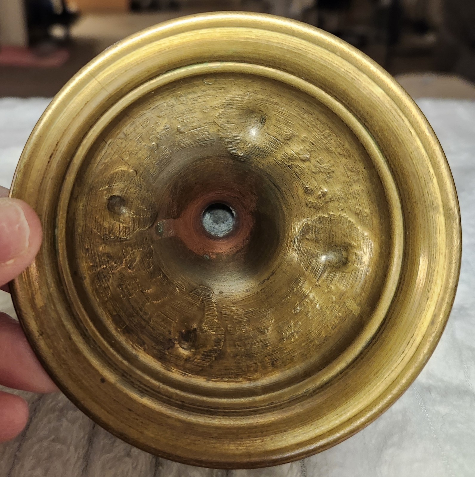 Antique Middle Eastern brass decorative set with engraved floral motifs.