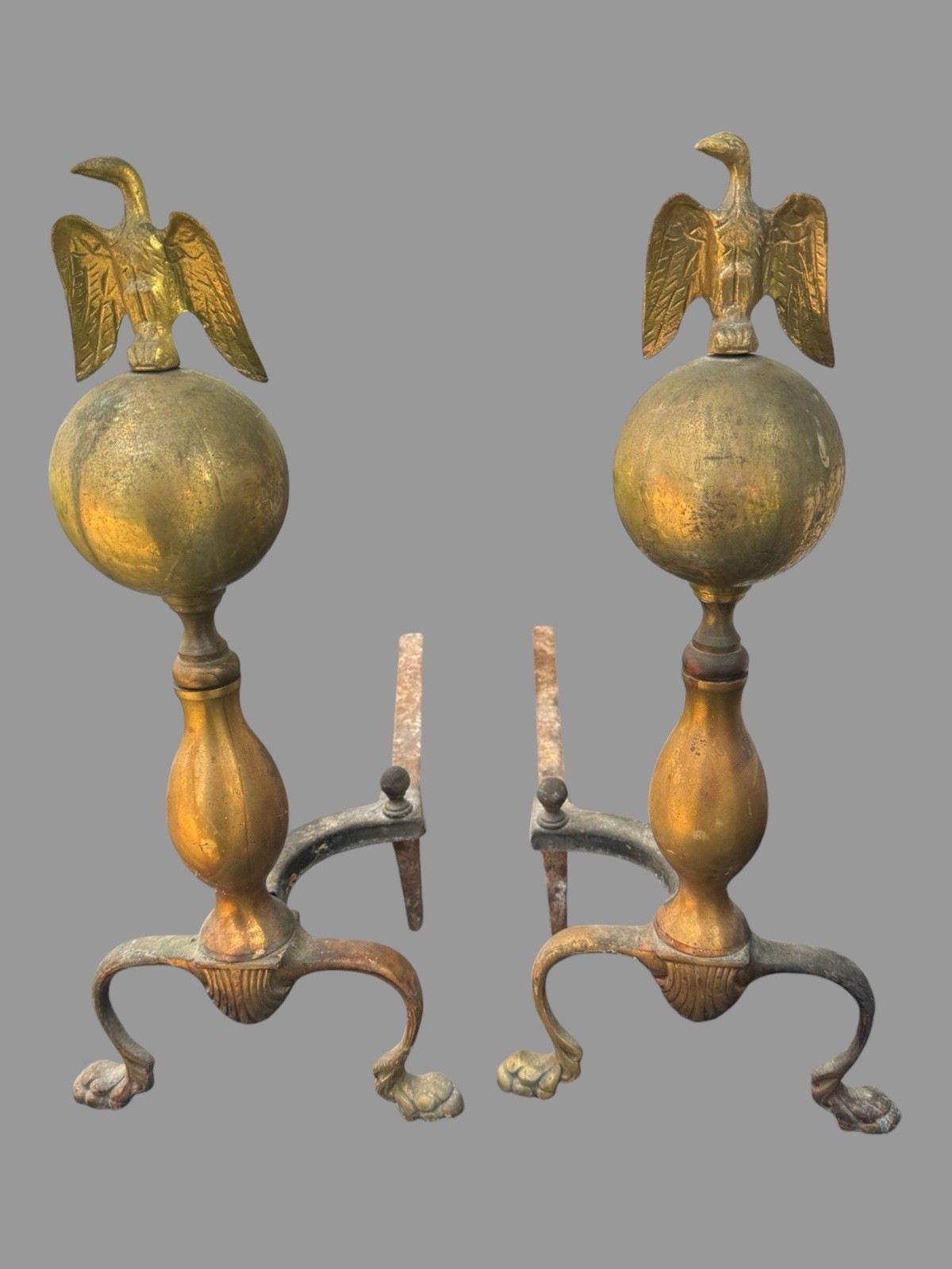 Pair Of Vintage Brass Colored Metal Andirons w Paw Feet And Figural Eagle Finial
