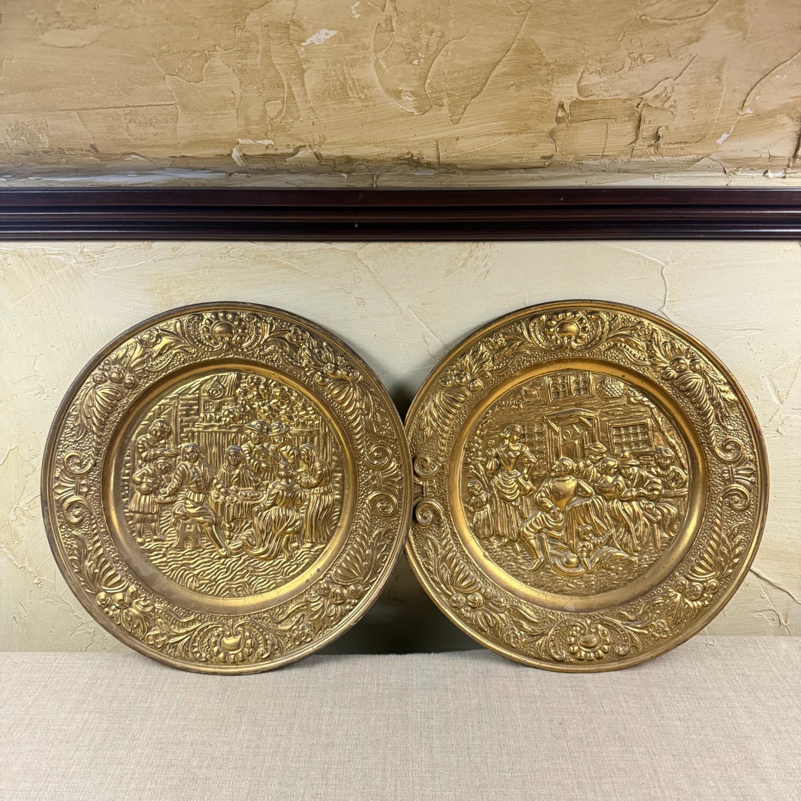 Vintage Embossed Brass Tone Dutch Village Wall Charger Plates 13″ Set of 2