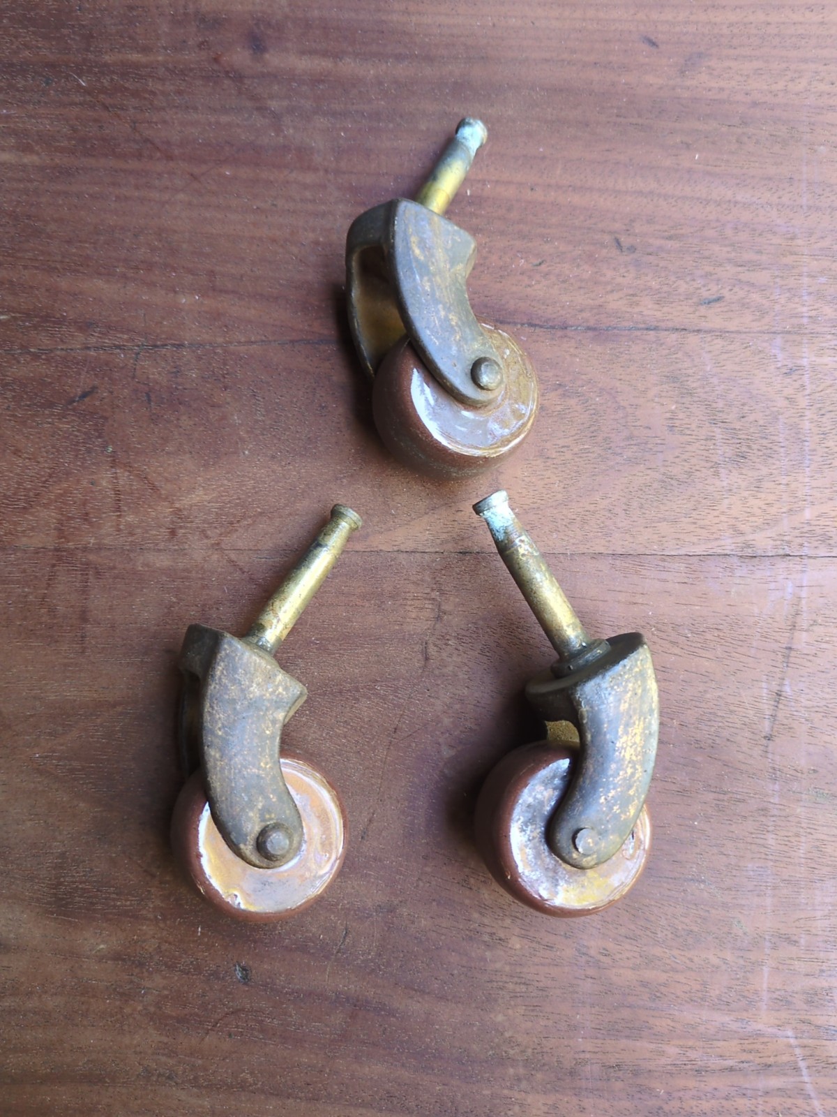 Vintage Brown Porcelain Swivel Furniture Caster Brass Wheels Lot Of 3