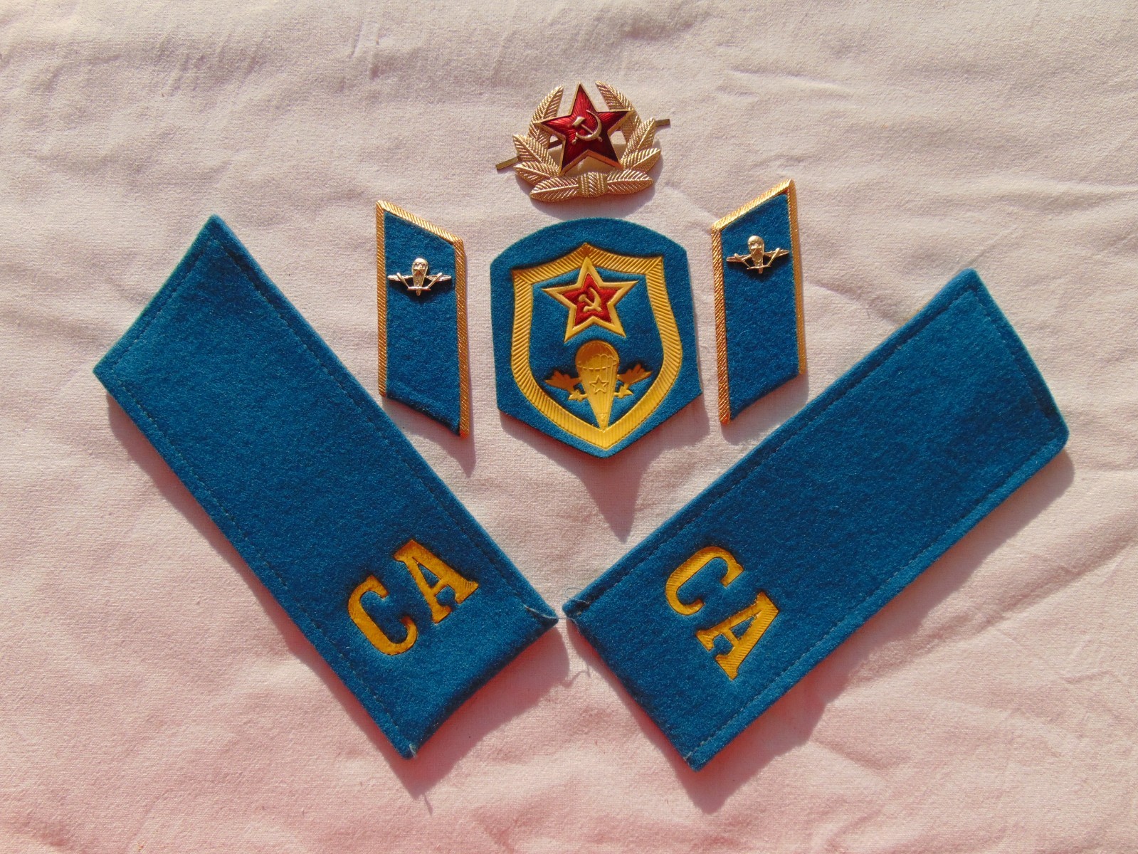 A Soviet airborne soldier’s uniform. Shoulder straps, chevron, and collar tabs.