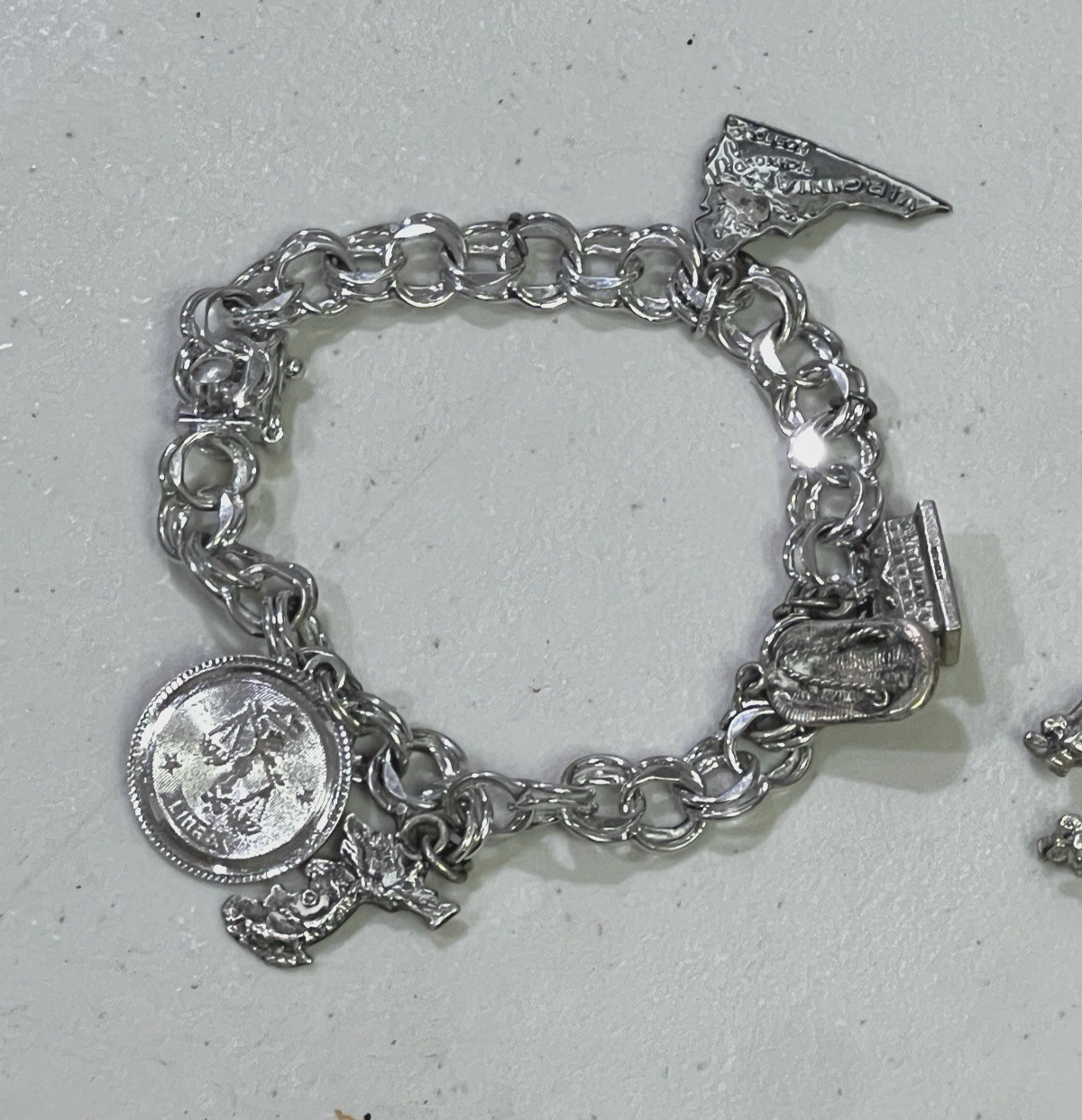 VINTAGE LOT OF 4 .925 STERLING SILVER CHARM BRACELETS W/ CHARMS 130 GRAMS