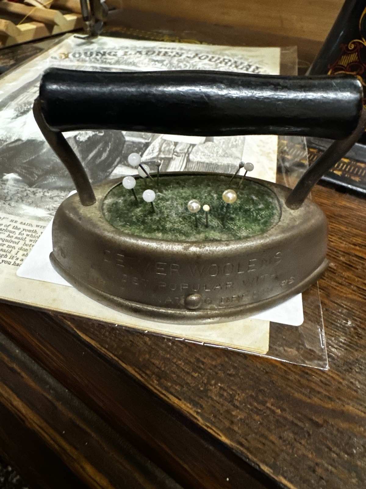 Antique pin cushion with vintage stick pins